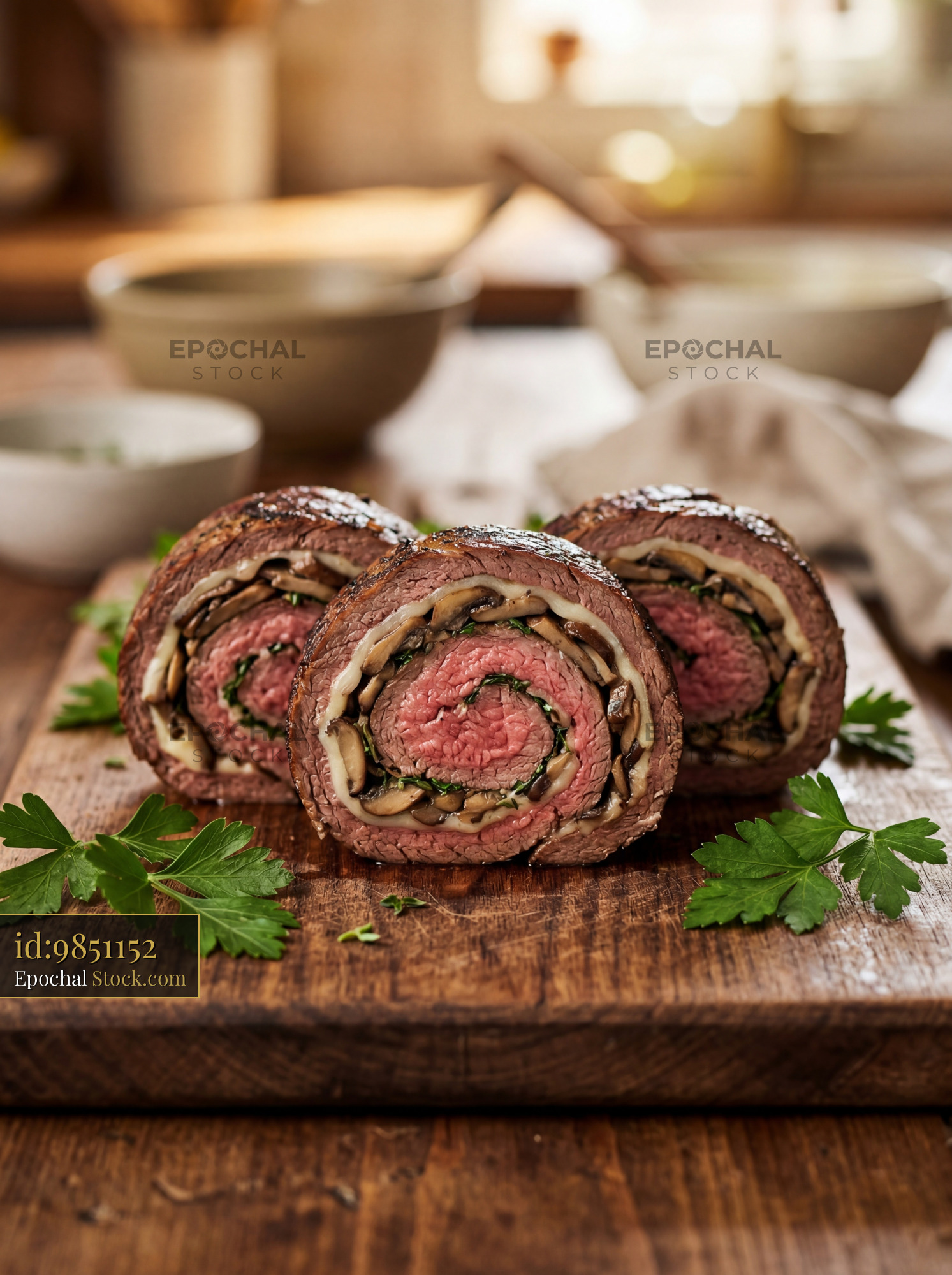 Beef Roulade Stuffed with Mushrooms on Cutting Board - stock photo