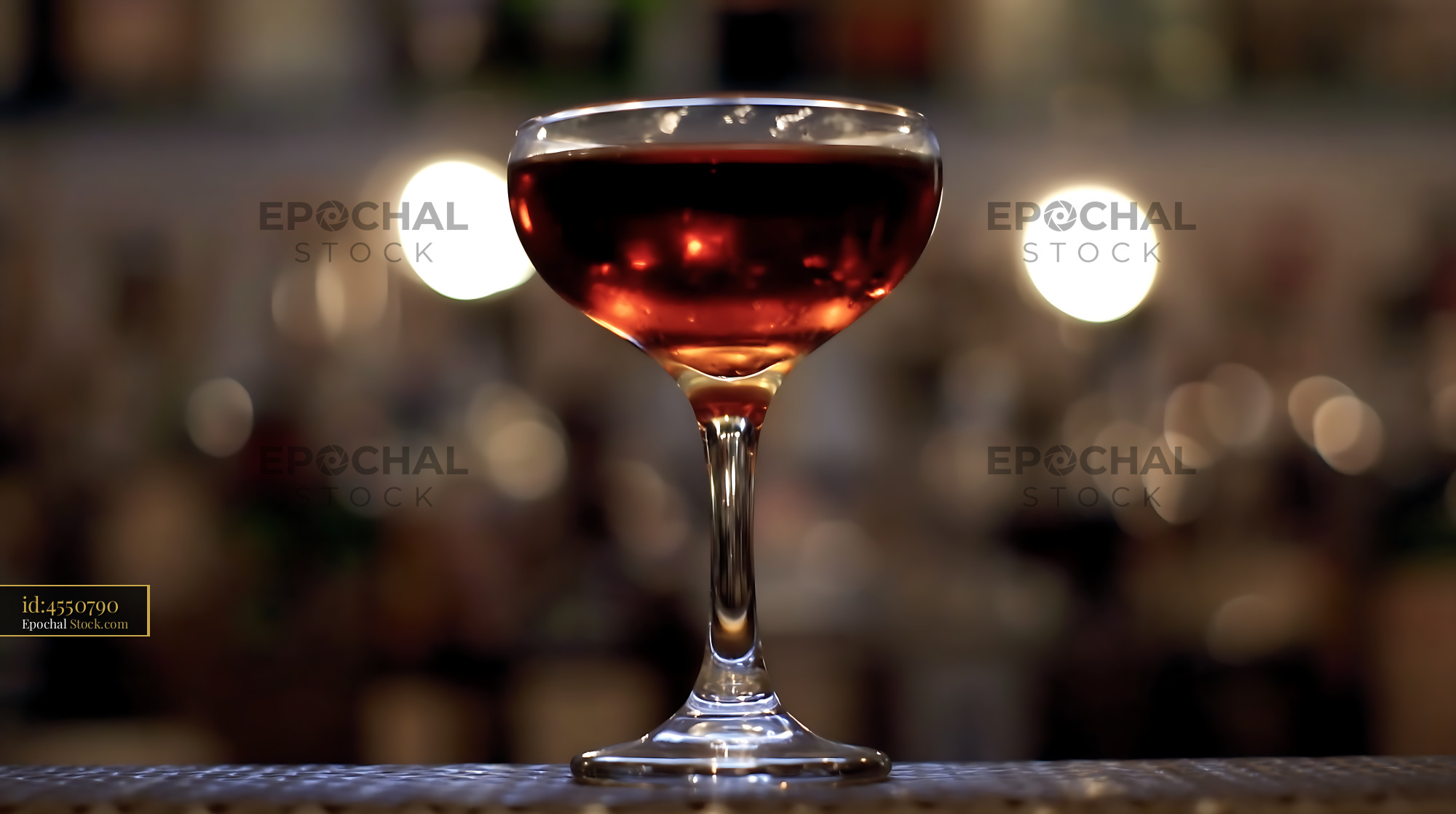 Bushwick Cocktail in Coupe Glass with Bokeh - stock photo