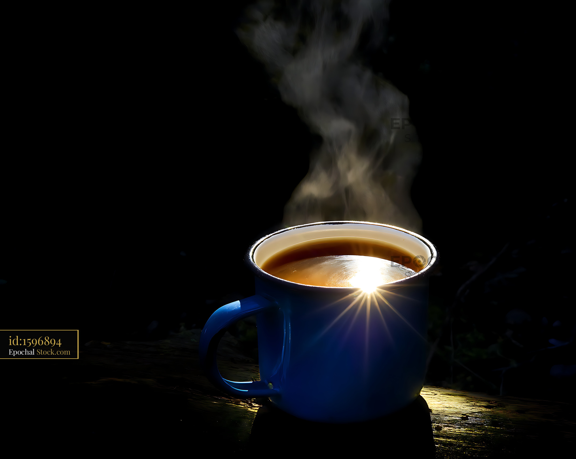 Steaming Blue Coffee Mug with Dramatic Lighting - stock photo