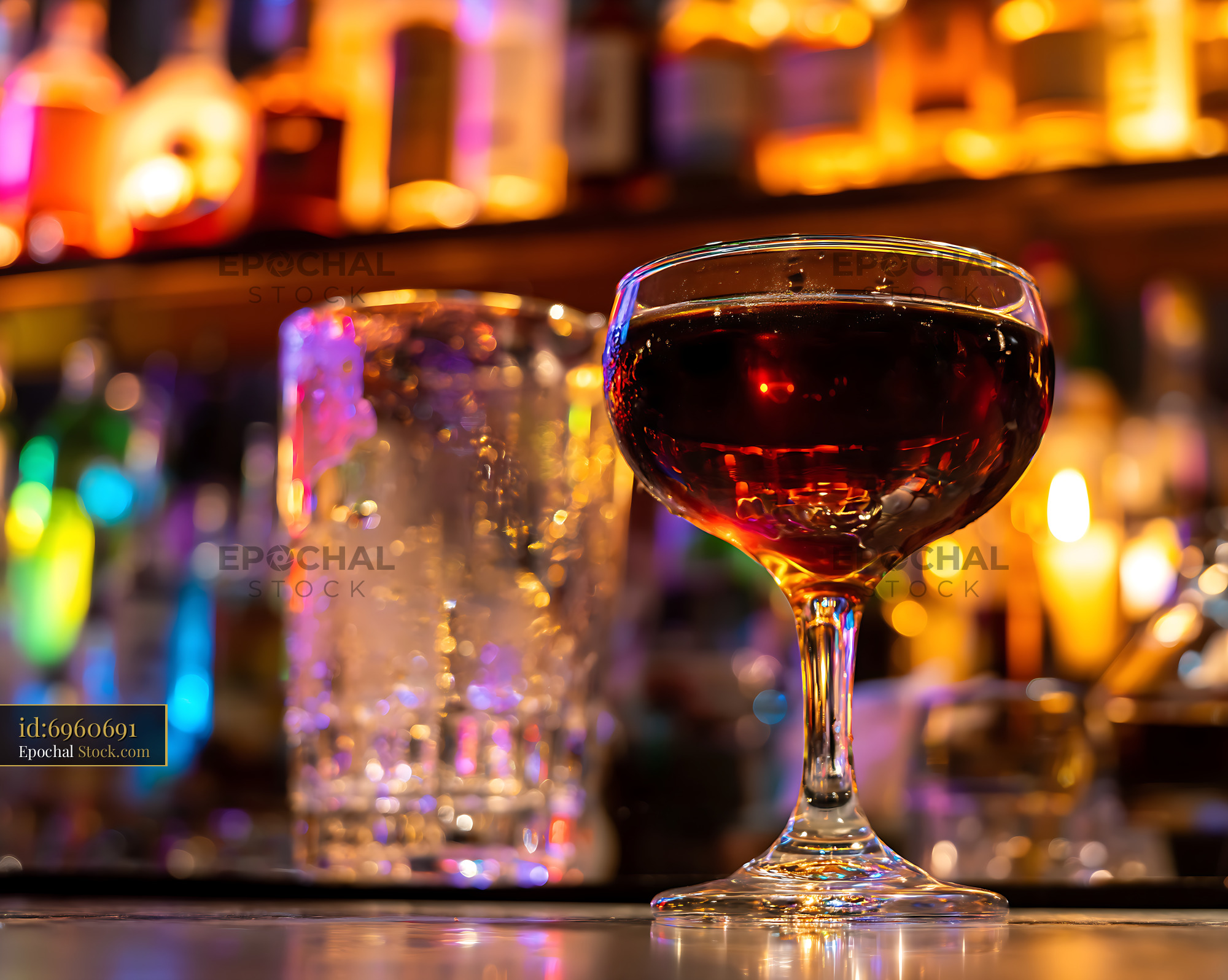 Bushwick Cocktail in Coupe Glass at Night Bar - stock photo