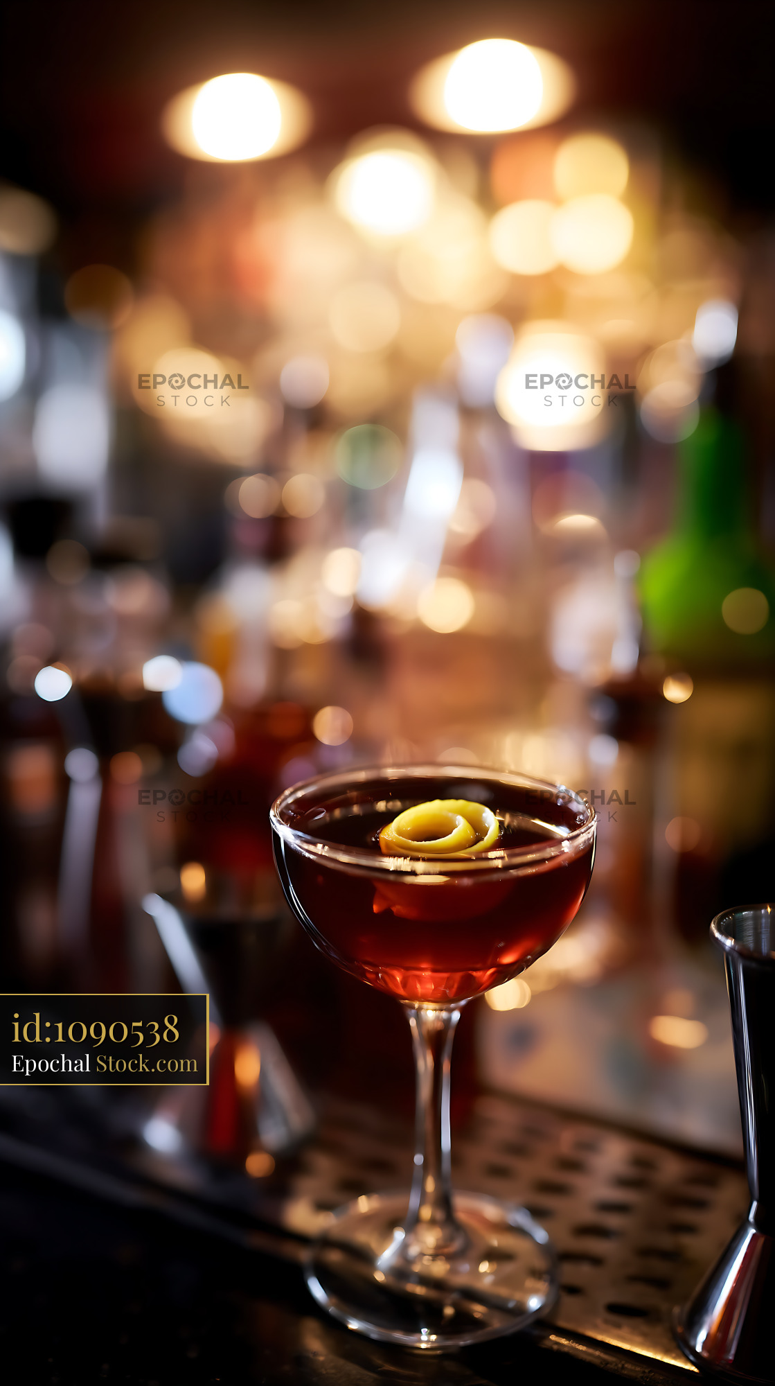 Bushwick Cocktail in Coupe Glass at Bar - stock photo