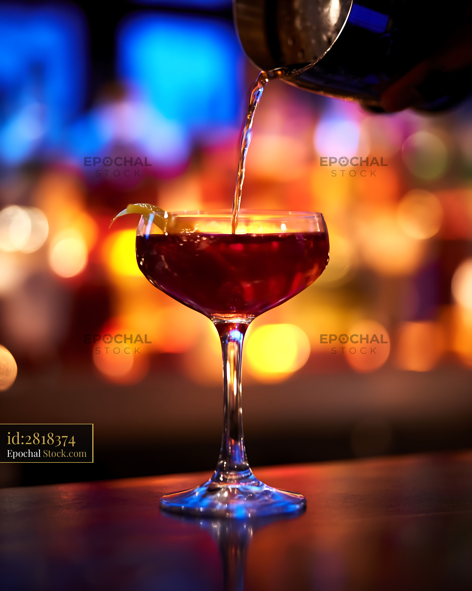 Bushwick Cocktail Being Poured Into Coupe Glass - stock photo