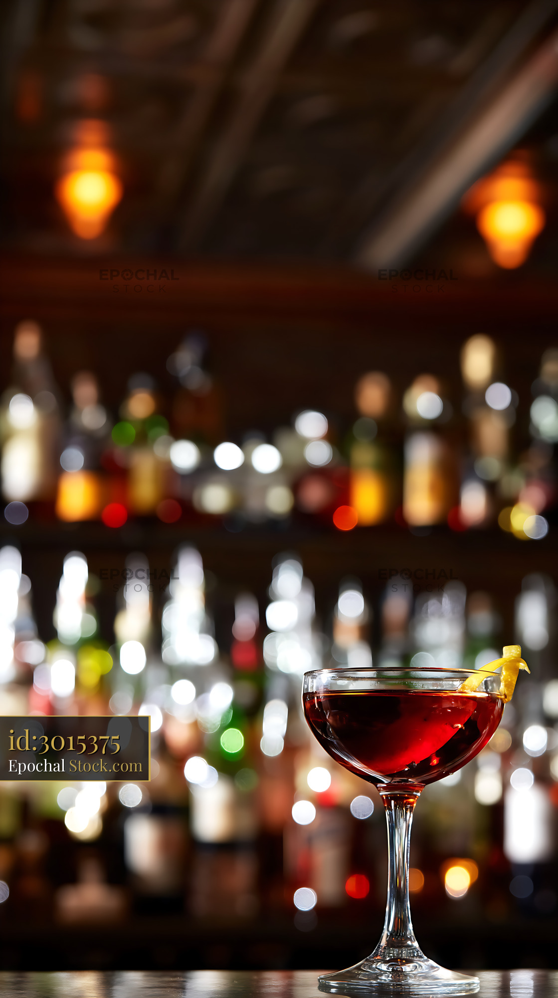 Bushwick Cocktail with Citrus Twist at Bar - stock photo