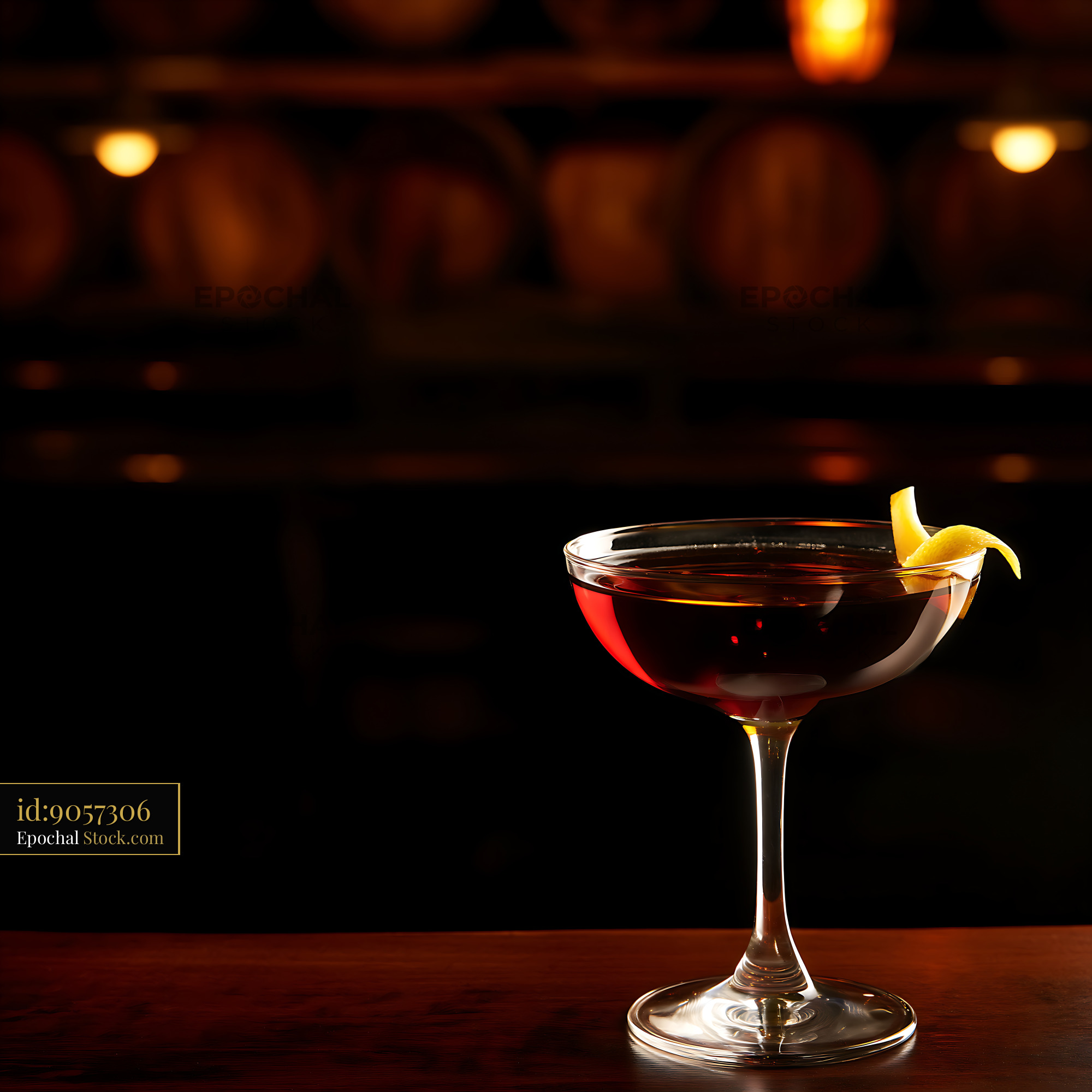 Saratoga Cocktail with Lemon Twist at Bar - stock photo