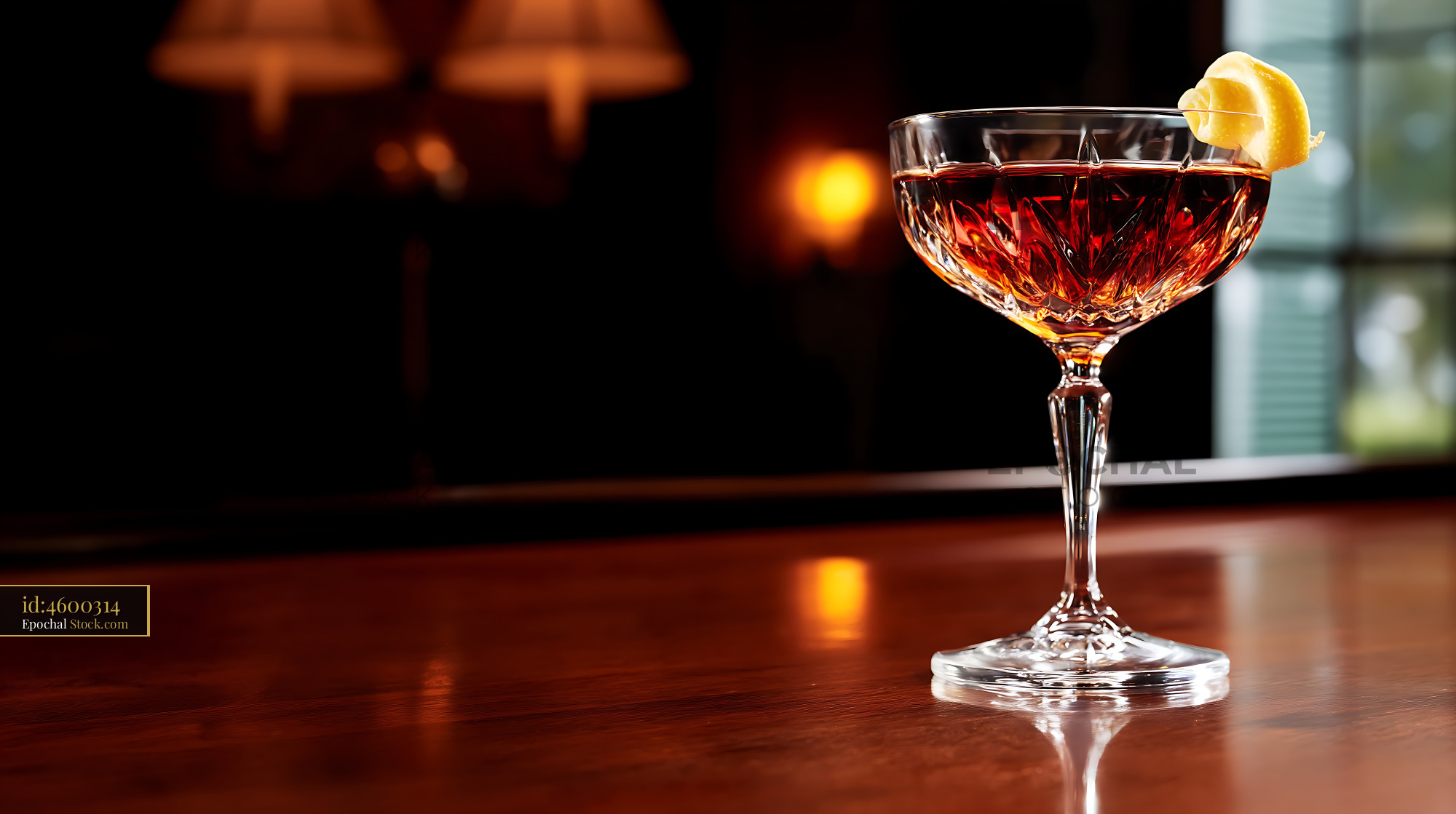 Saratoga Cocktail with Lemon on Bar Counter - stock photo