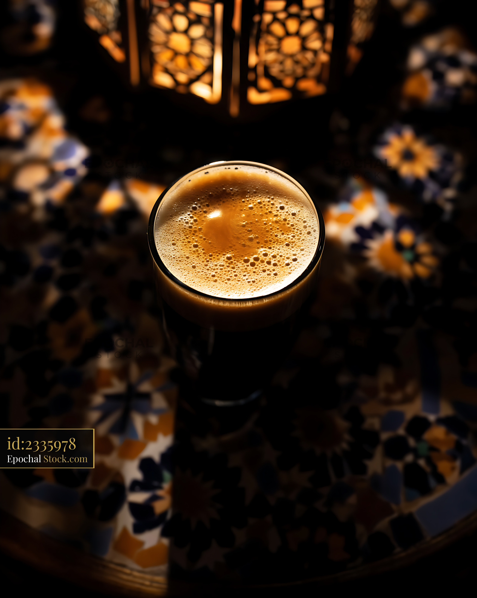 Nitro Caramel Coffee in Warm Ambient Light - stock photo