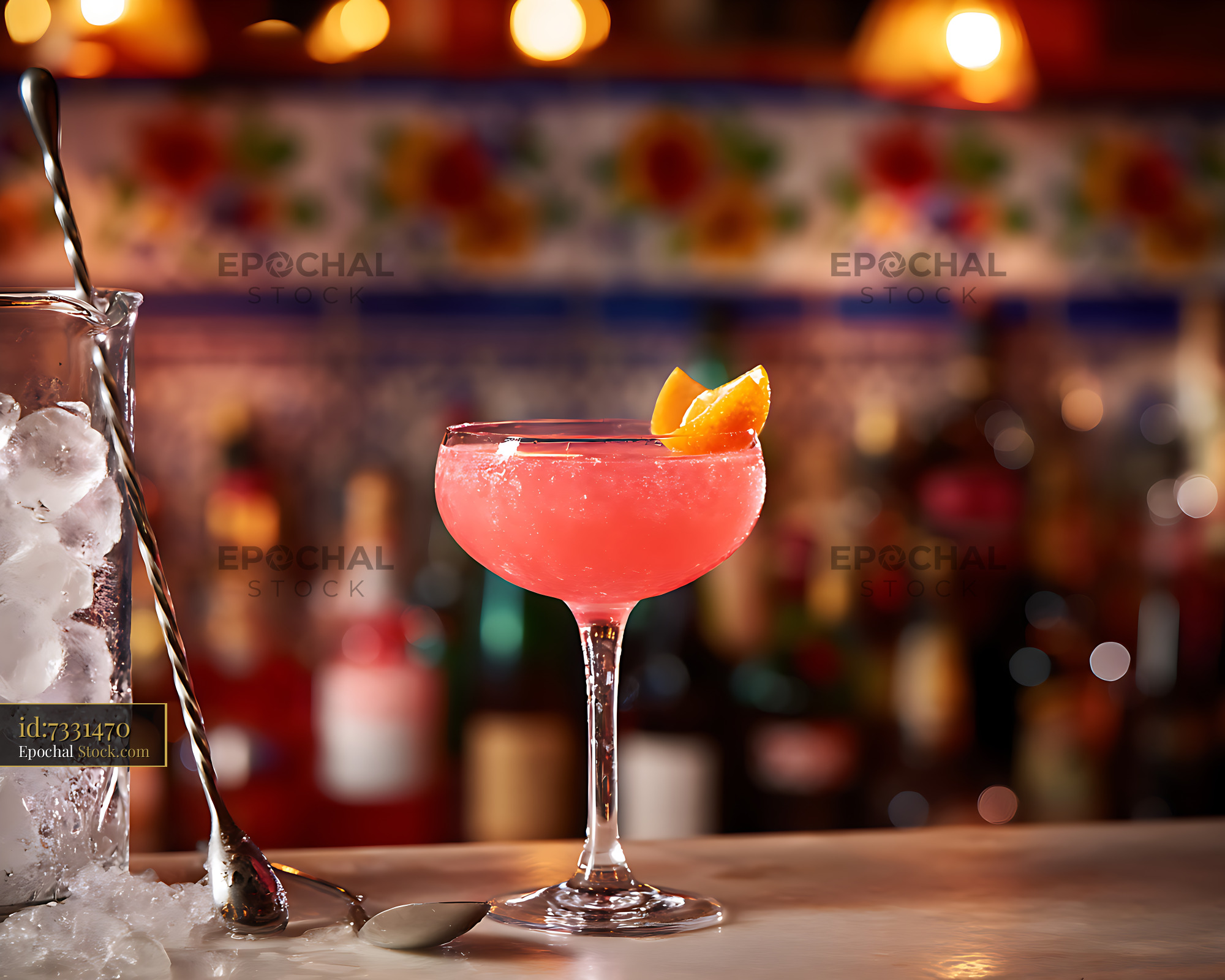 Pink Cocktail with Citrus Garnish at Luxury Bar - stock photo