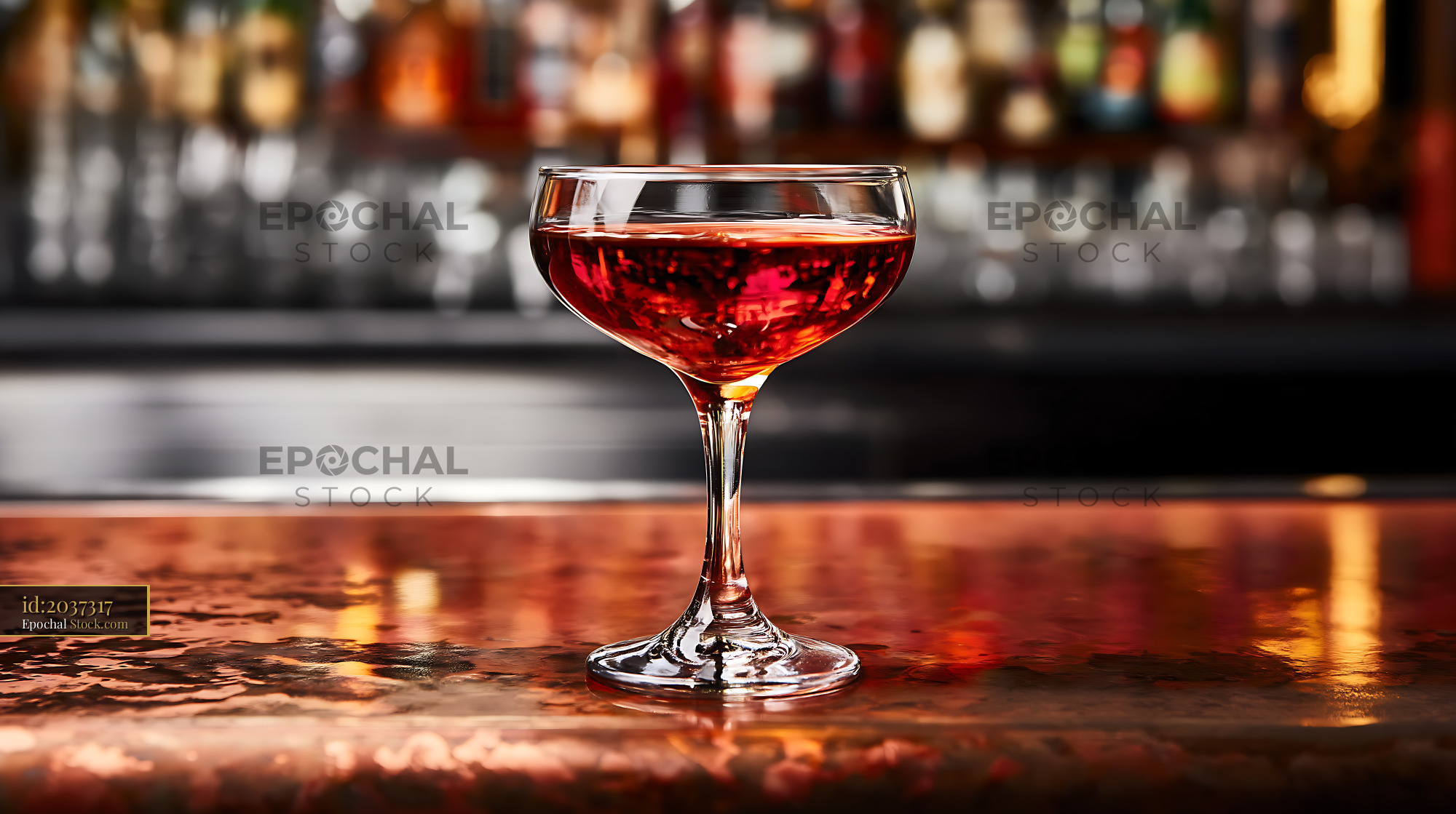 Bushwick Cocktail in Coupe Glass at Bar - stock photo