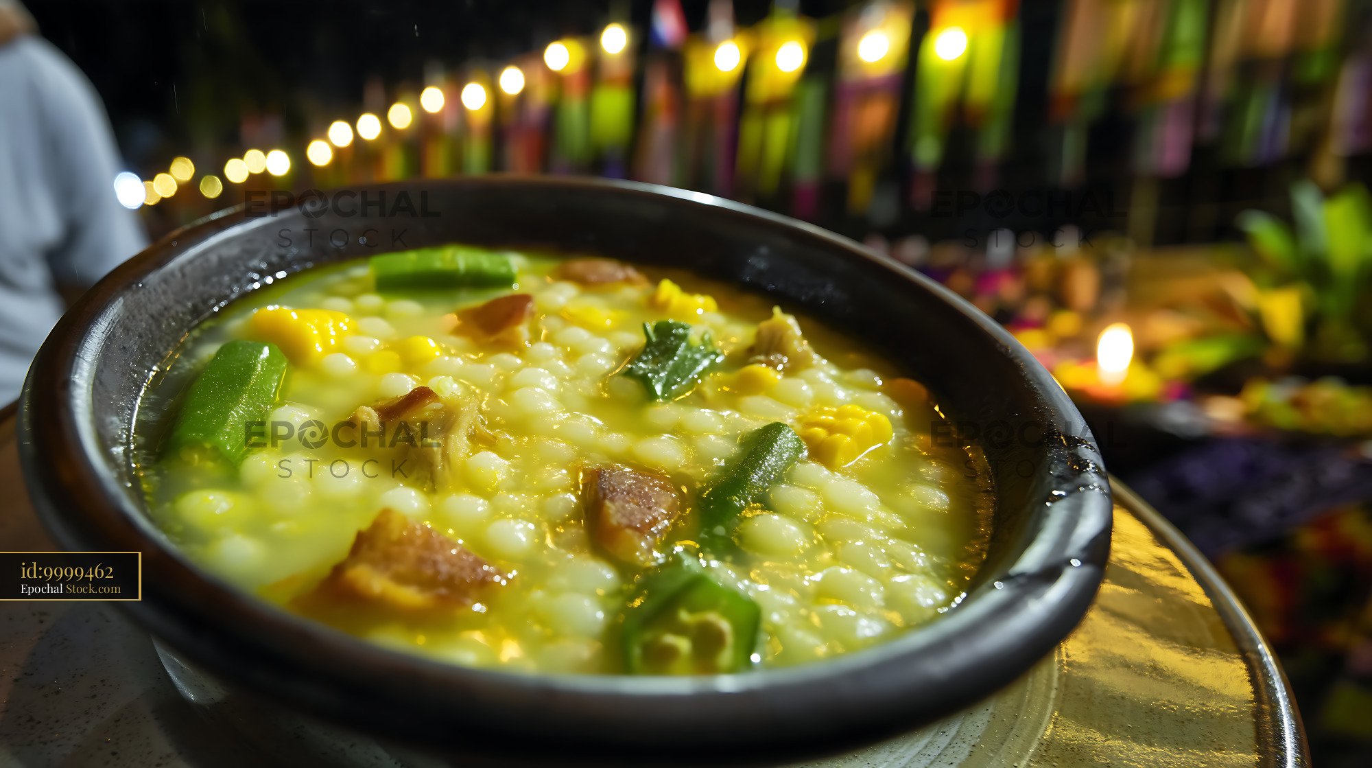 Kapurung Soup in Rustic Bowl at Festive Night Market - stock photo