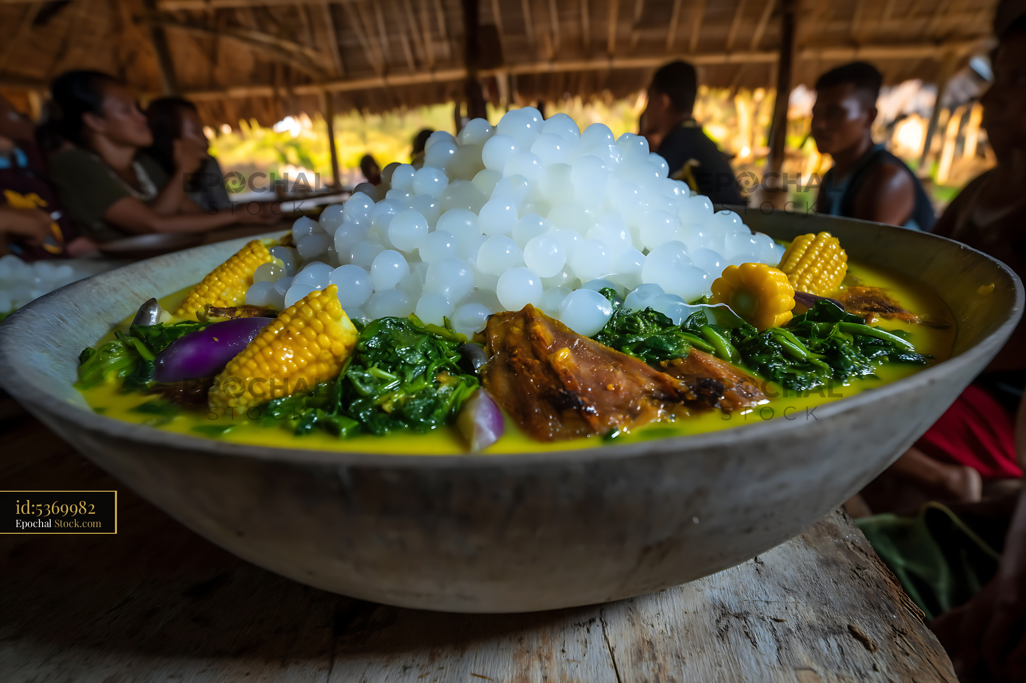 Kapurung Soup Served in Traditional Communal Setting - stock photo