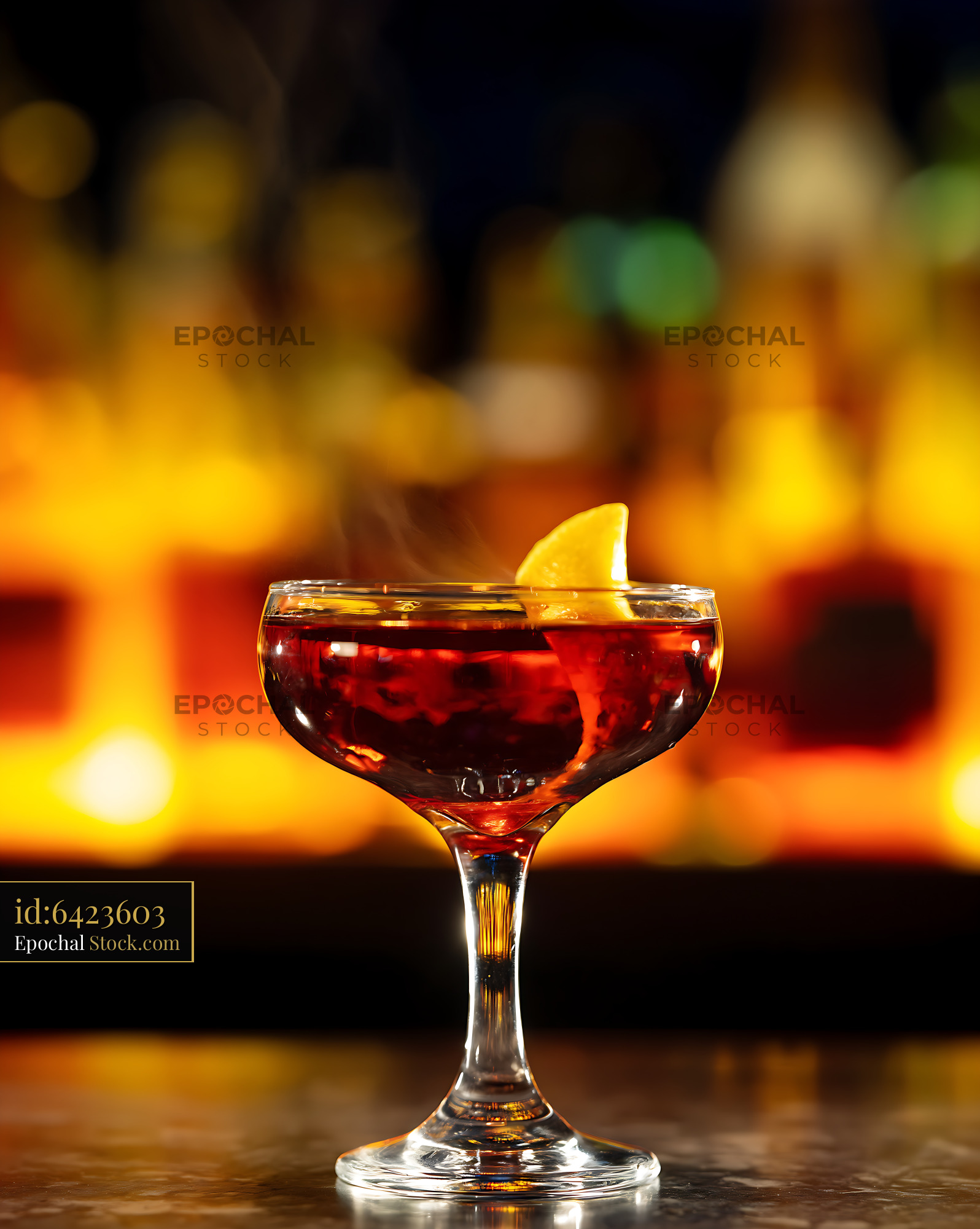 Bushwick Cocktail with Lemon Wedge at Bar - stock photo