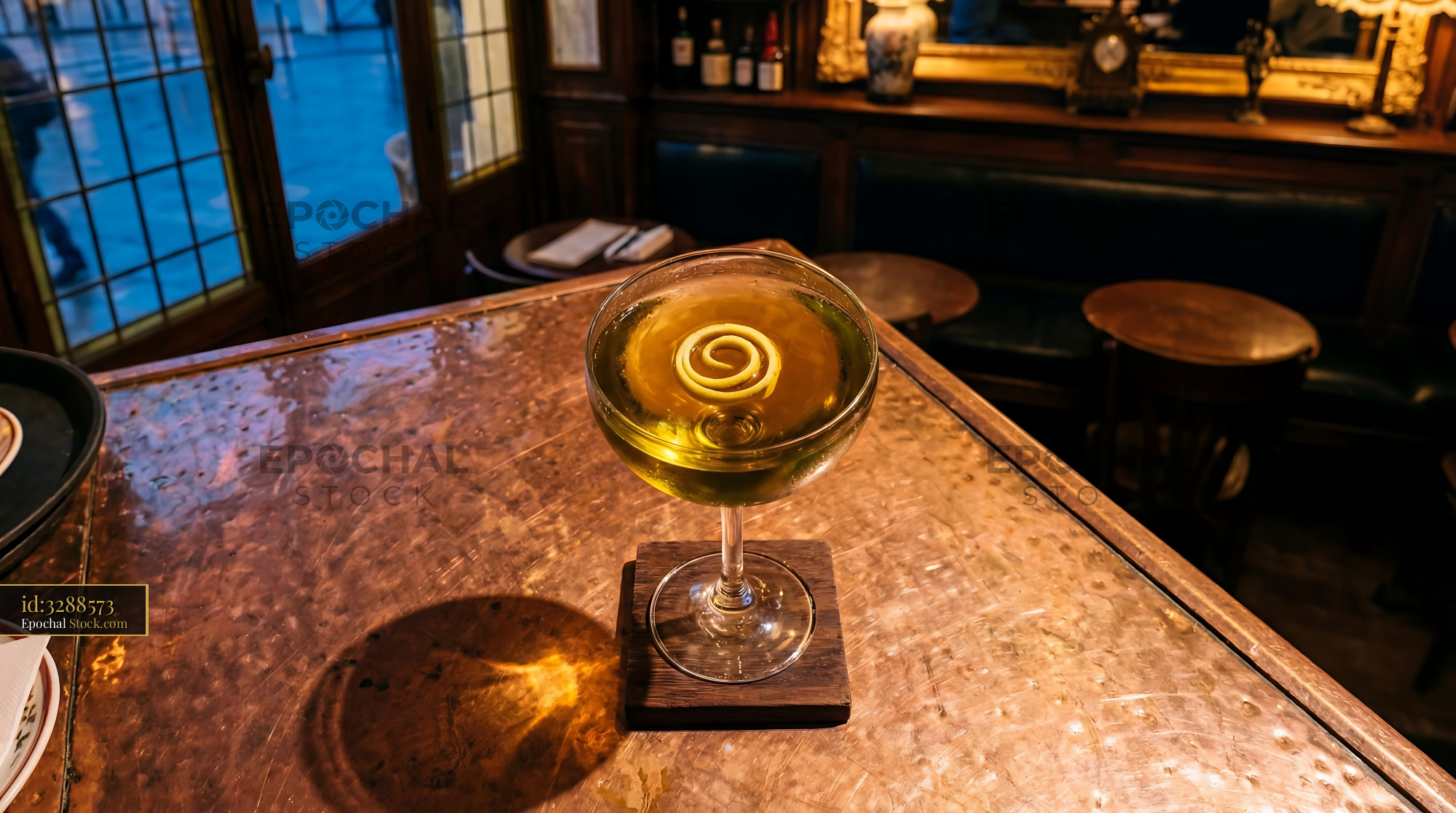 Tipperary Cocktail with Spiral Lemon Peel - stock photo