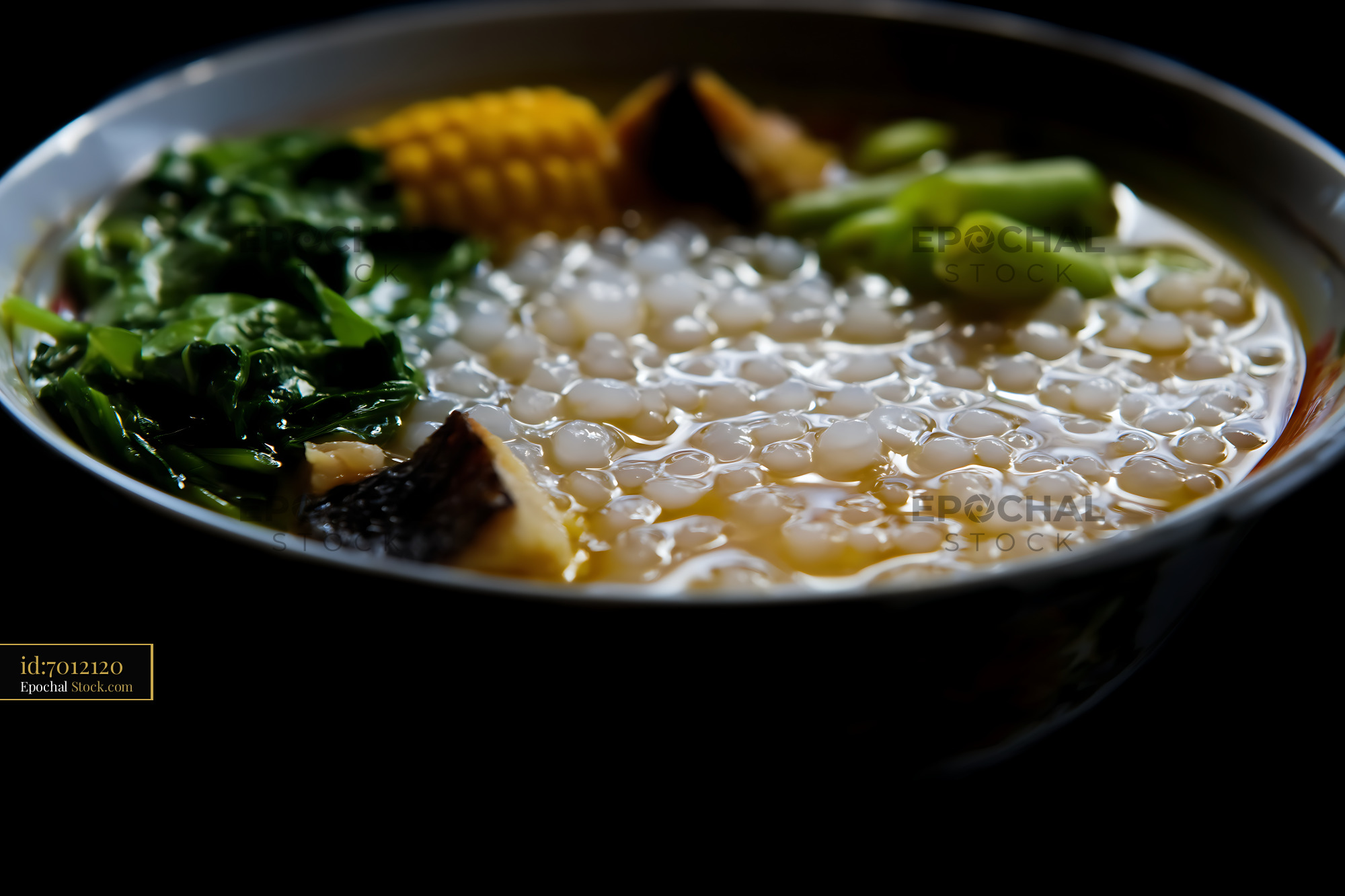 Lor Mee Soup with Sago, Corn, and Greens in Bowl - stock photo