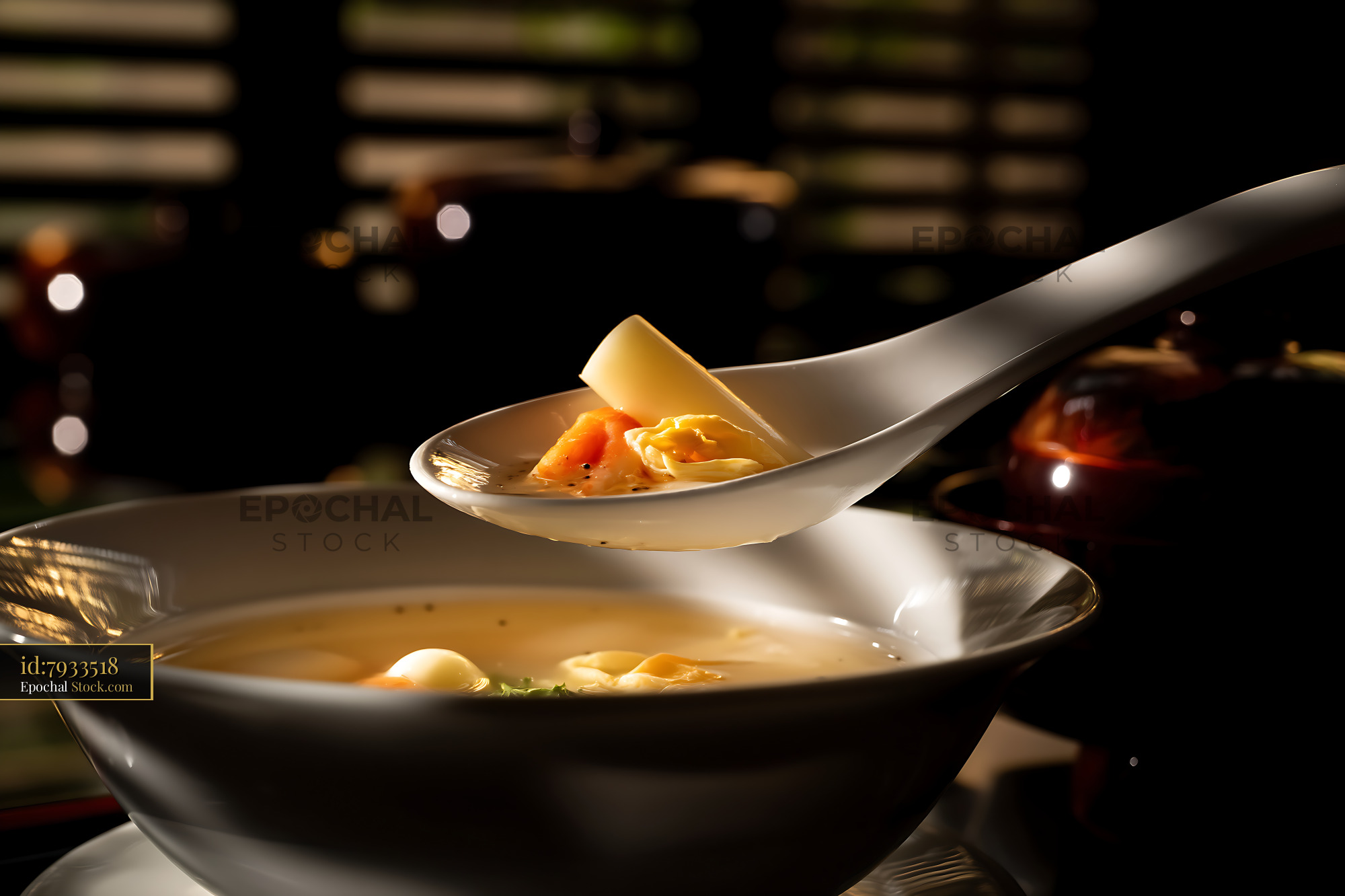 Sup Mang Cua Soup Served with Spoon in Elegant Setting - stock photo