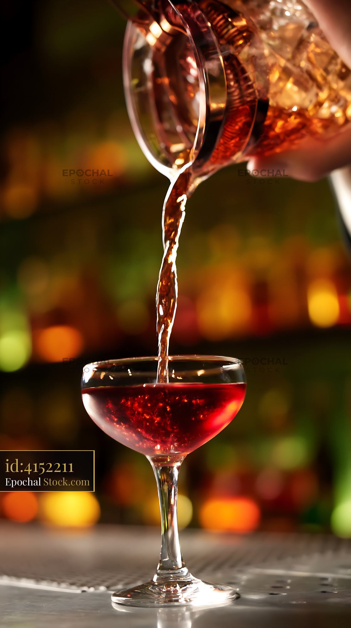 Bushwick Cocktail Poured Into Coupe Glass - stock photo