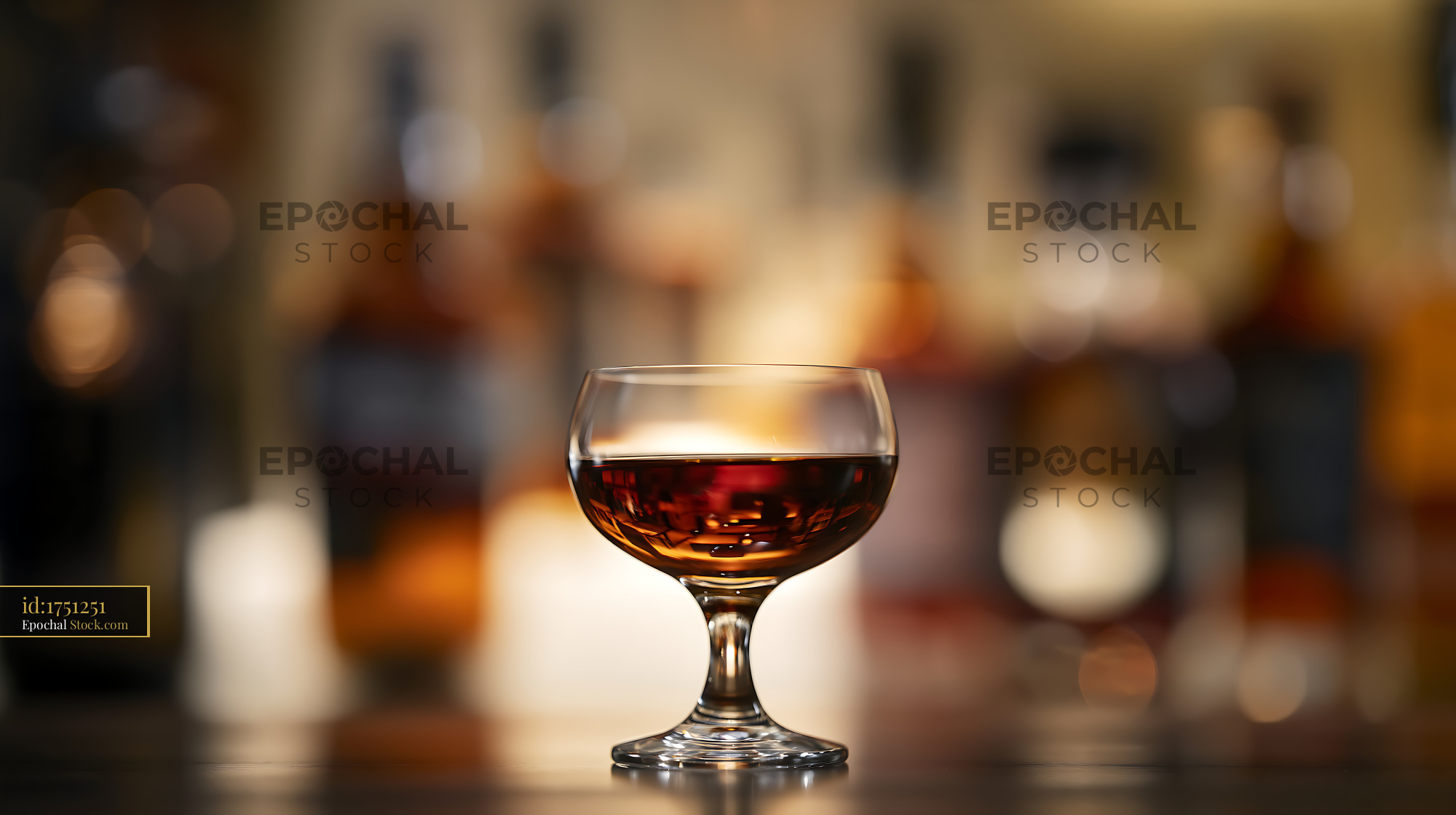 Bushwick Cocktail in Coupe Glass at Bar - stock photo