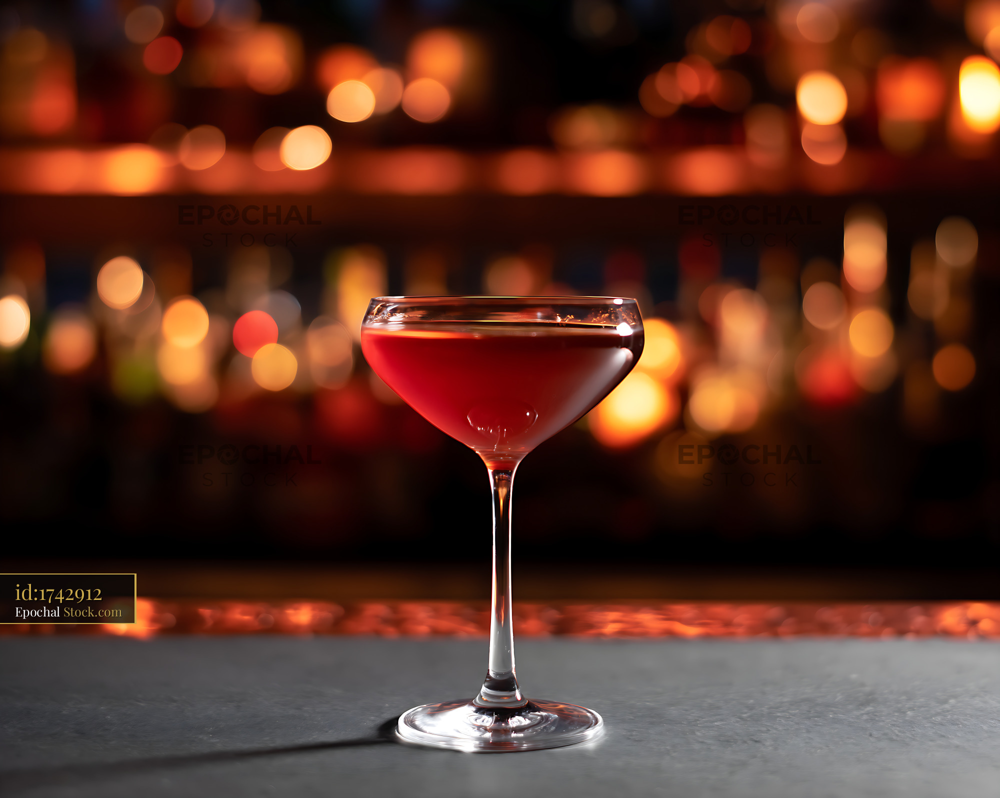 Bushwick Cocktail in Coupe Glass at Bar - stock photo