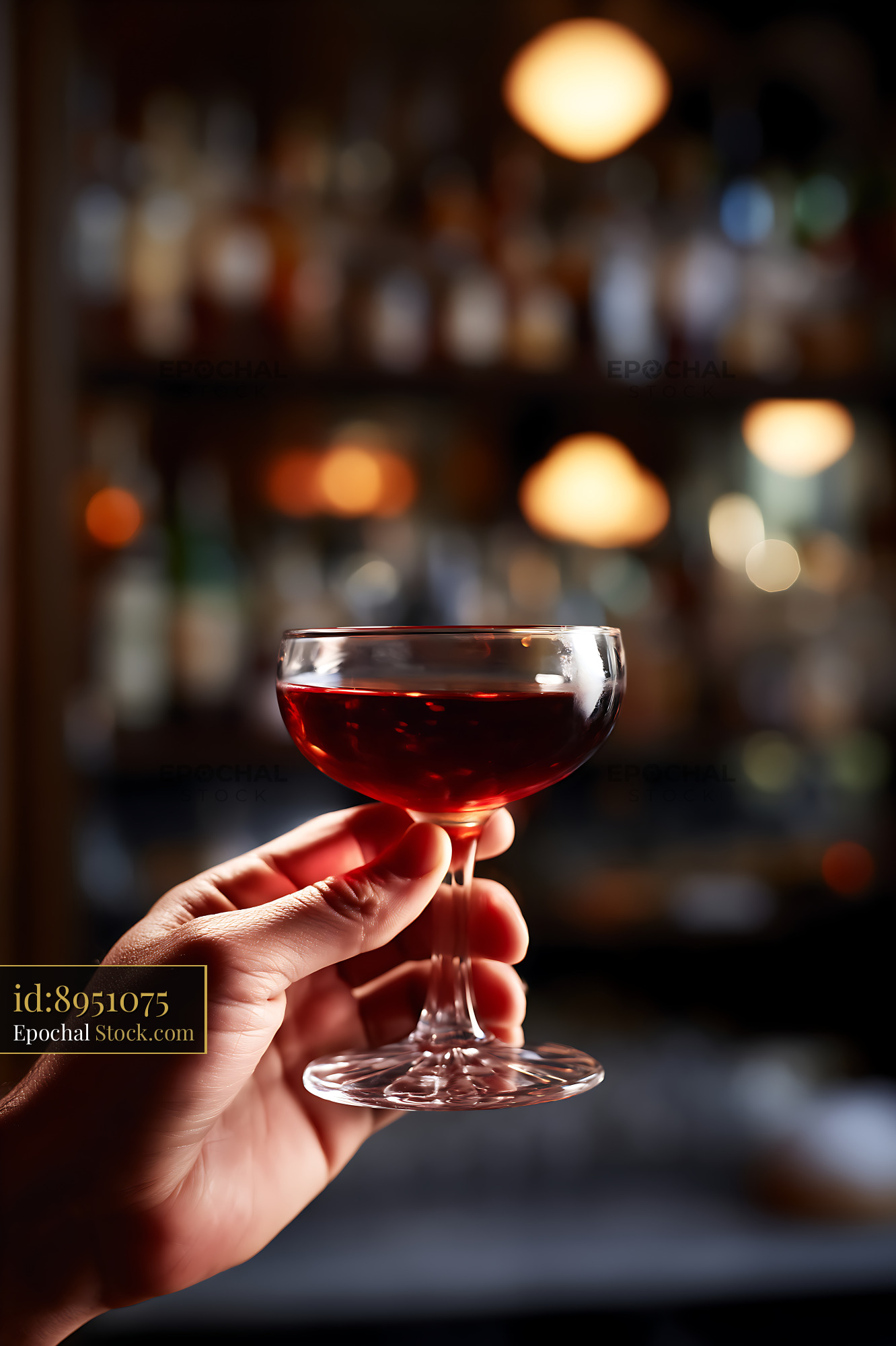 Bushwick Cocktail in Elegant Coupe Glass at Bar - stock photo