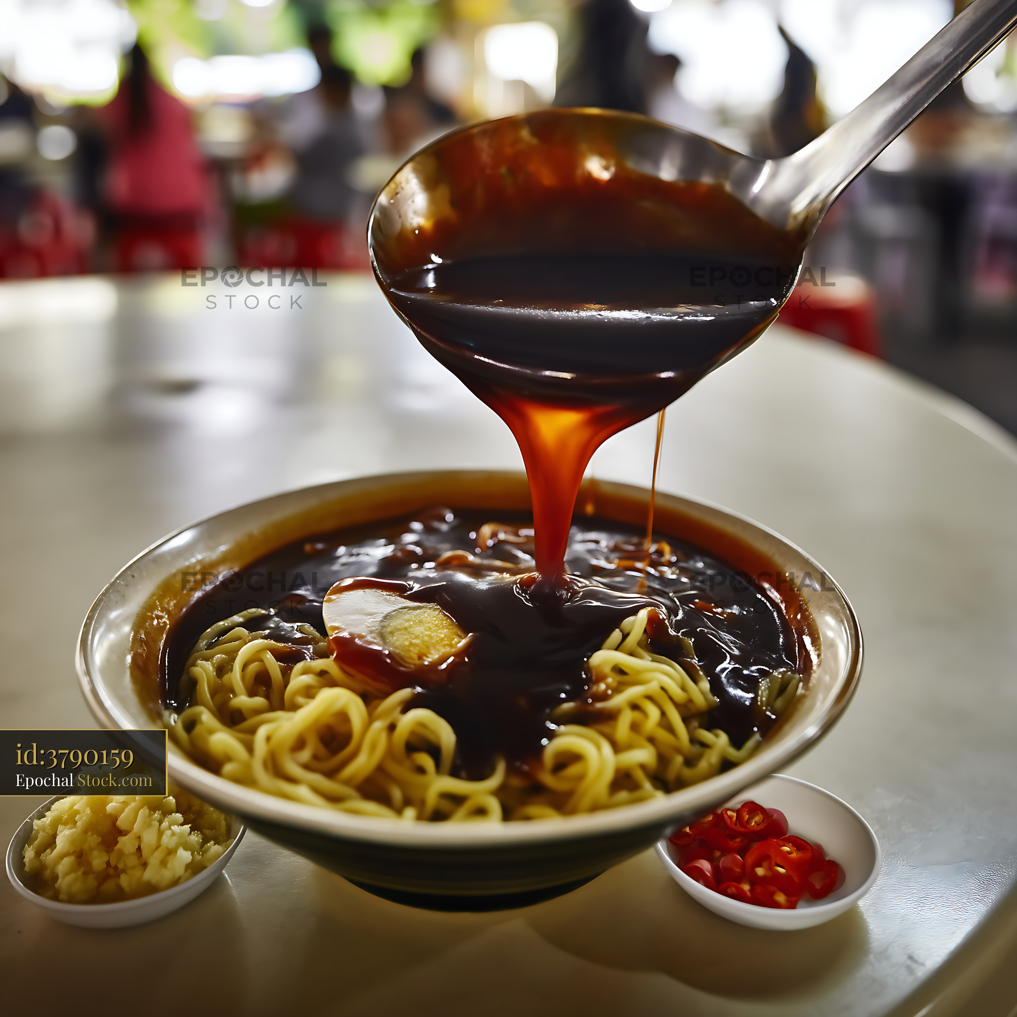 Lor Mee Soup Poured Over Noodles in Asian Food Stall - stock photo