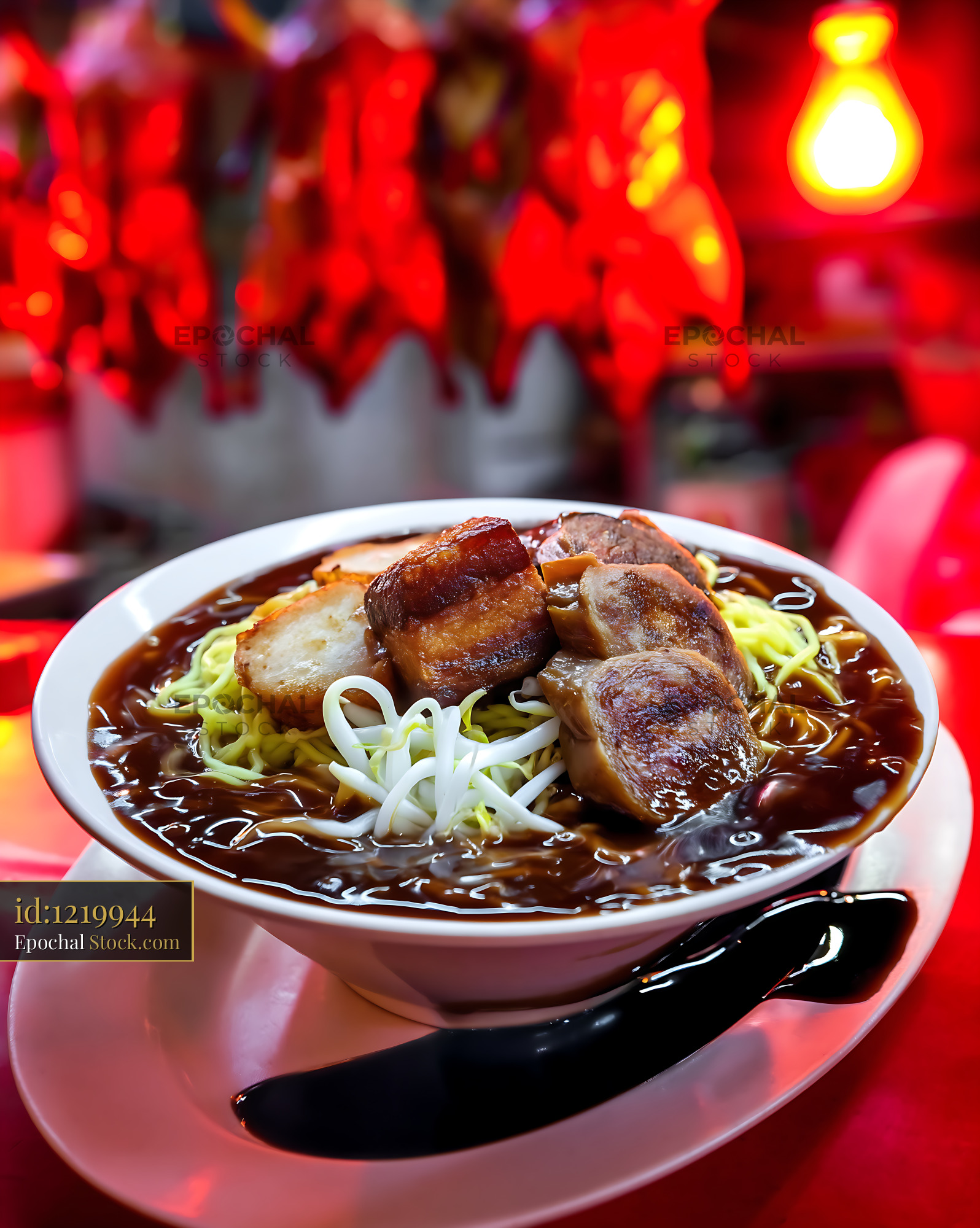 Rich Lor Mee Soup Bowl with Braised Pork Belly at Eatery - stock photo