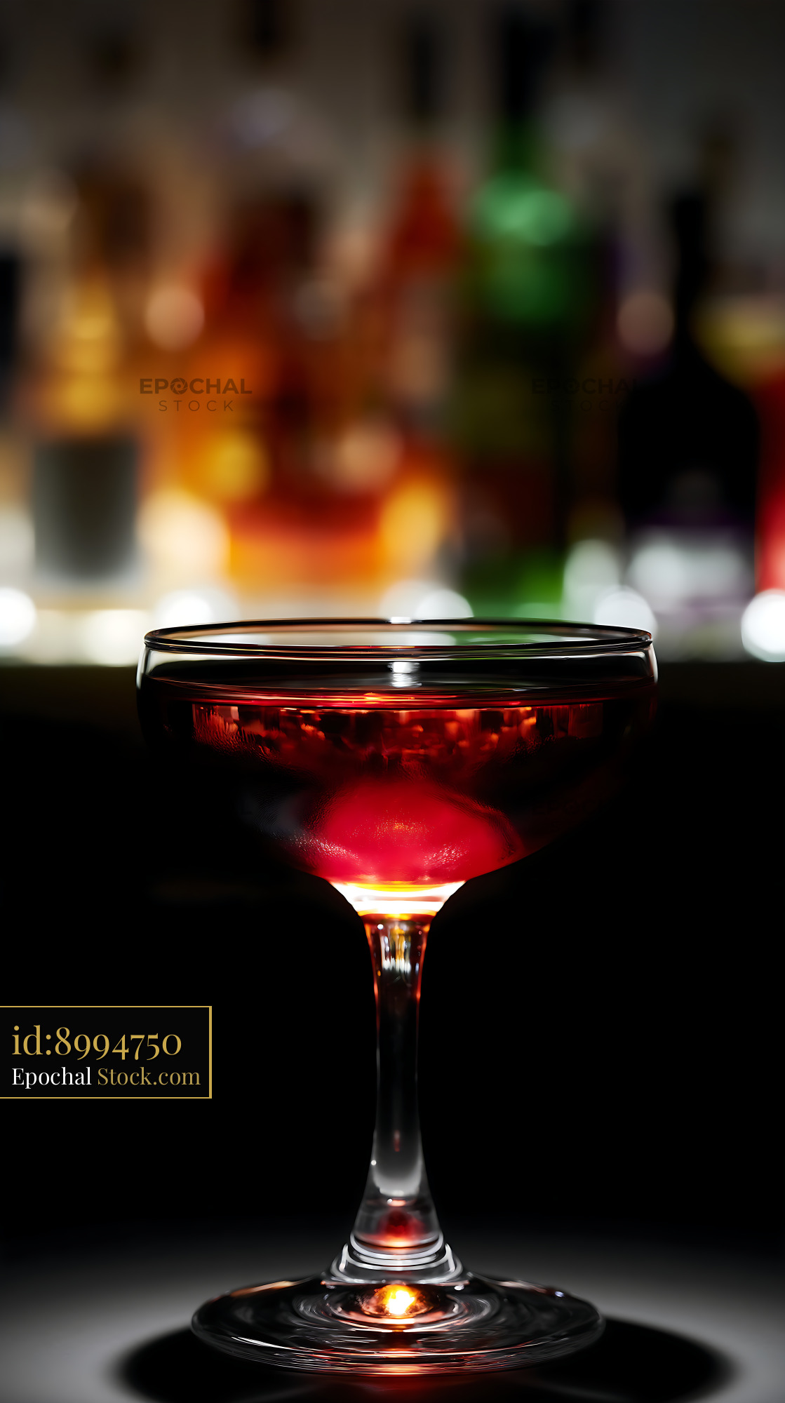 Bushwick Cocktail in Coupe Glass at Bar - stock photo