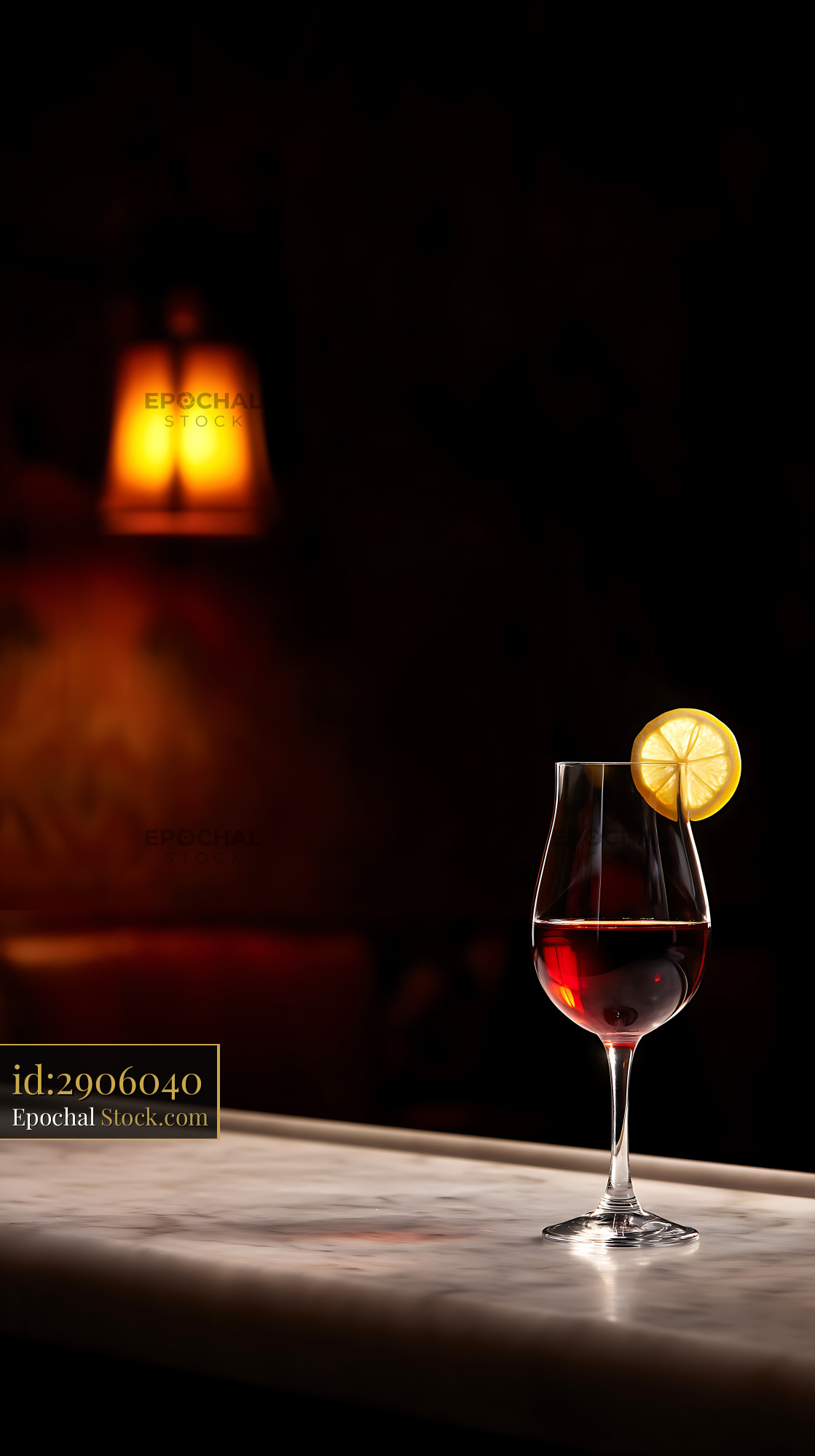 Saratoga Cocktail with Lemon Garnish at Night - stock photo