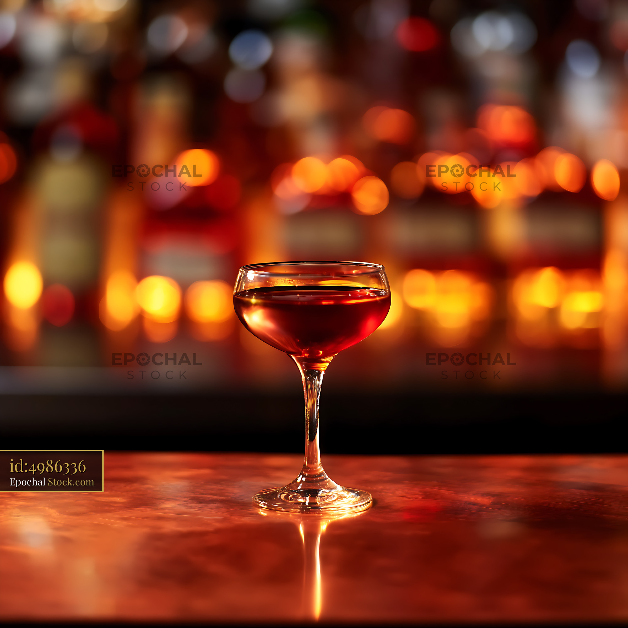 Bushwick Cocktail on Warm-Lit Bar Counter - stock photo