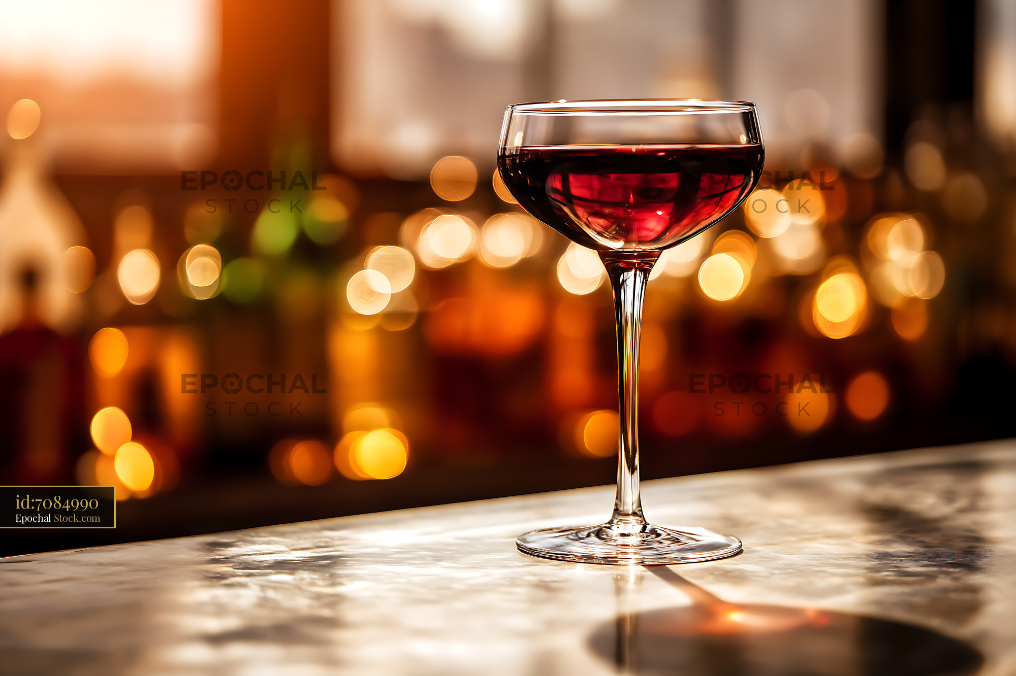 Red Wine Glass Elegant Evening Ambiance Bokeh - stock photo