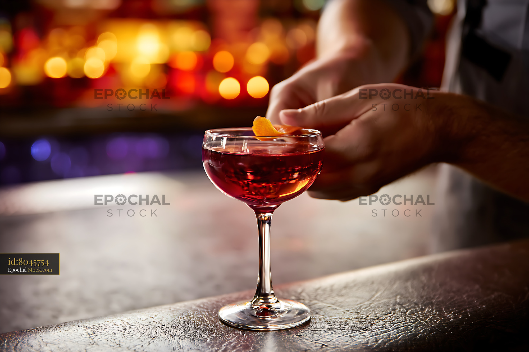 Bushwick Cocktail with Citrus Peel at Bar - stock photo