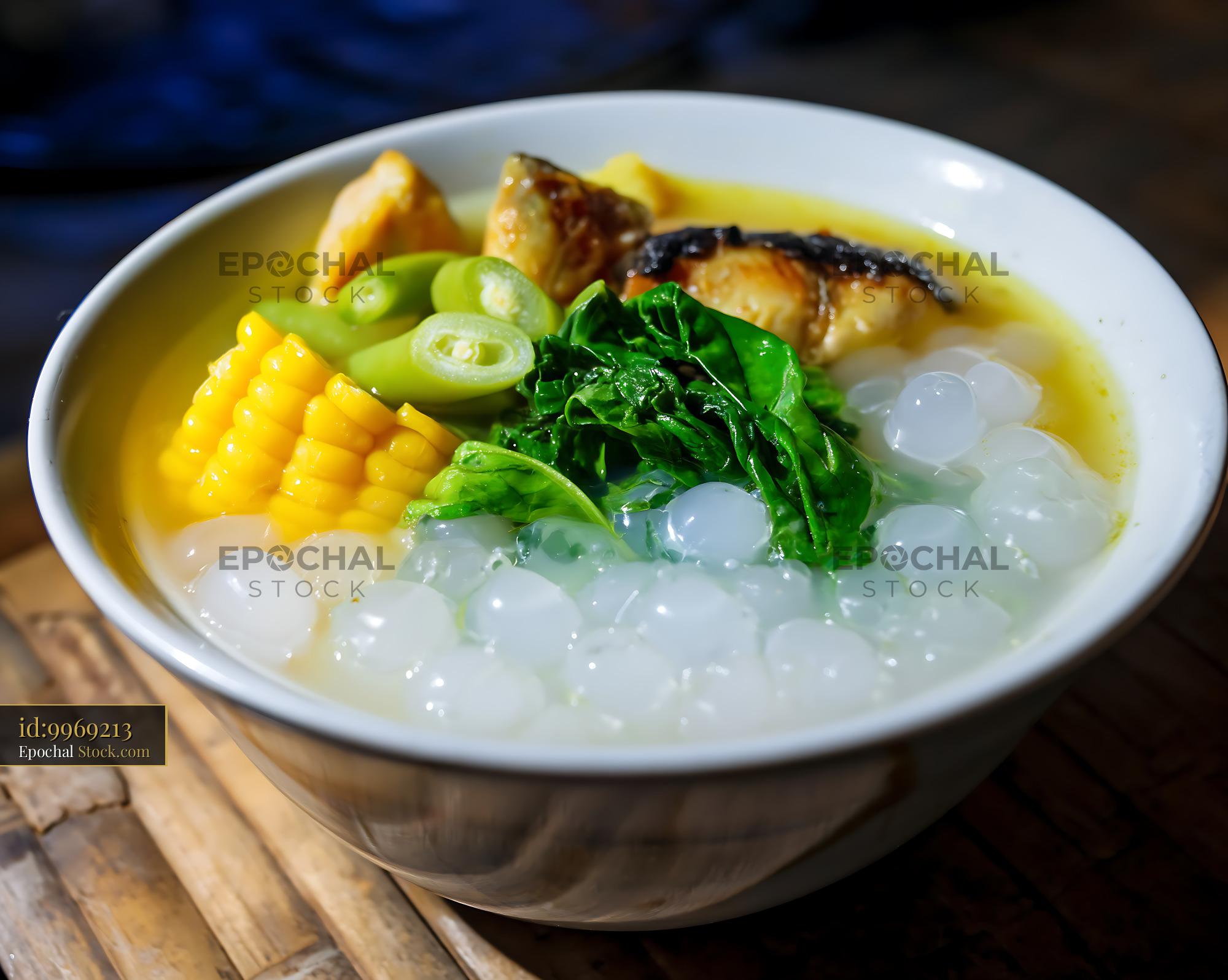 Vibrant Lor Mee Soup Bowl on Bamboo Mat - stock photo