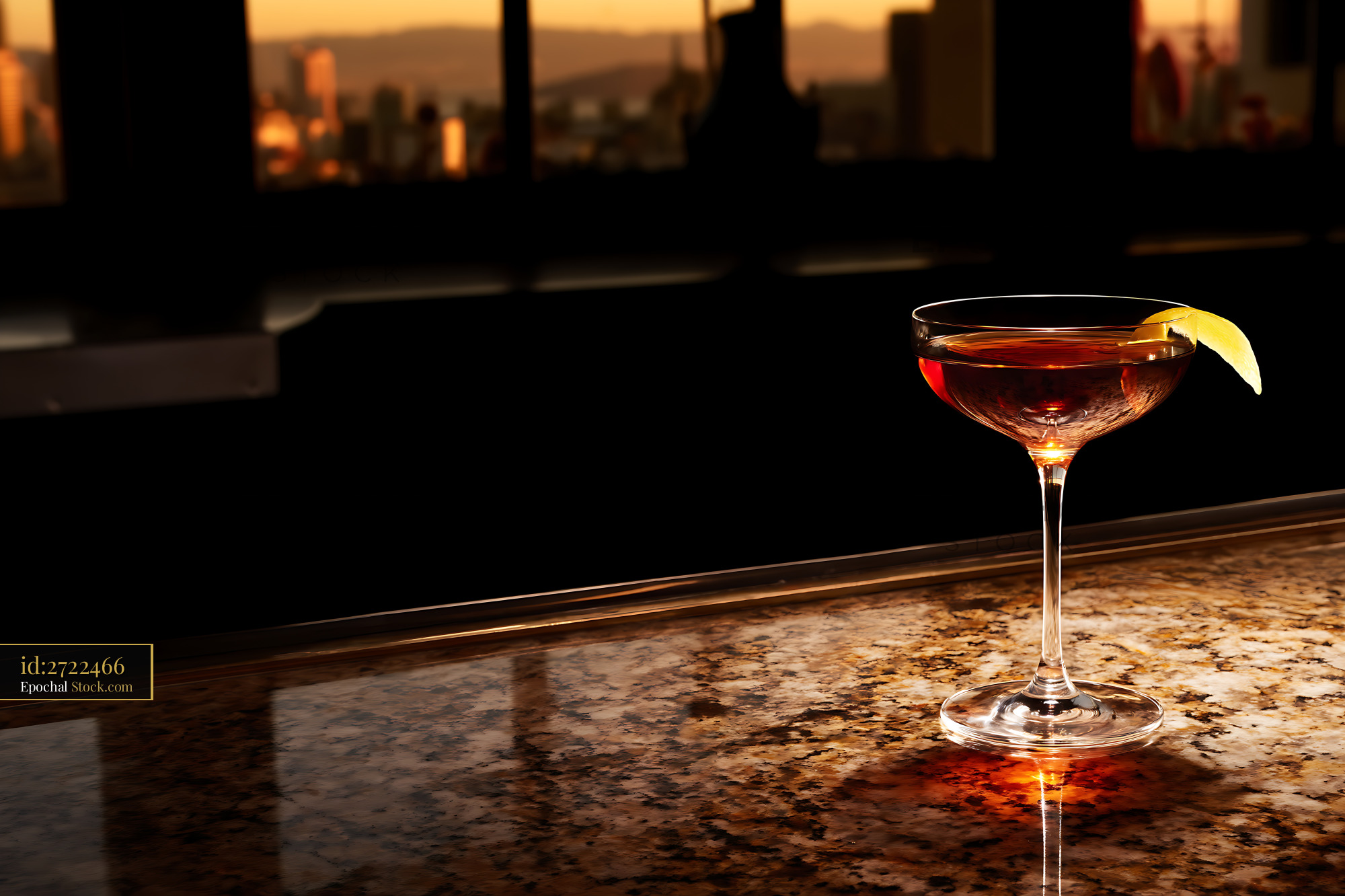 Saratoga Cocktail with Lemon at Sunset - stock photo