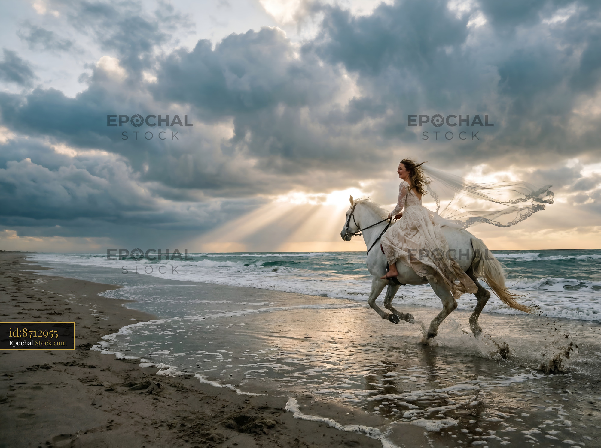 Woman rides horse on beach at sunset near ocean waves Premium Stock Image
