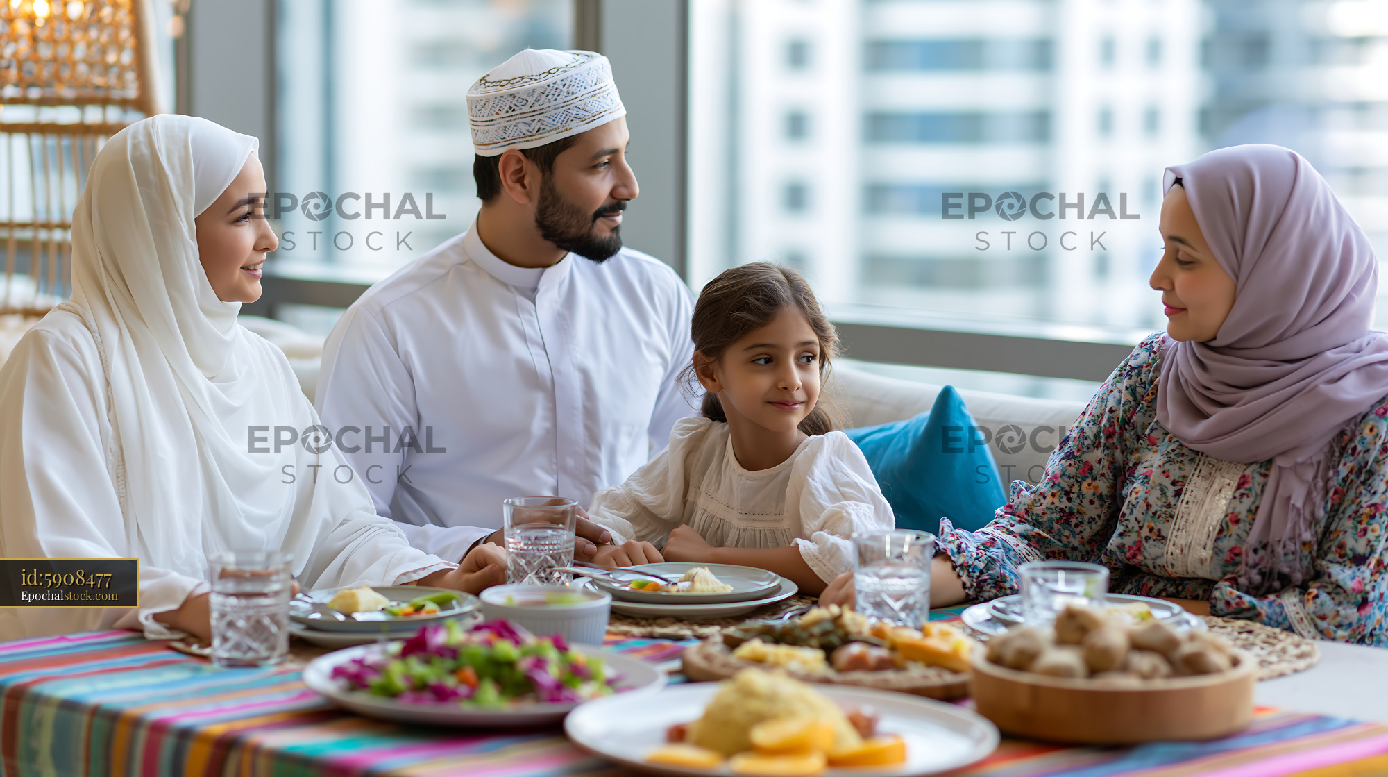 Watermarked full-resolution preview of Family gathering around a dining table with Middle Eastern dishes