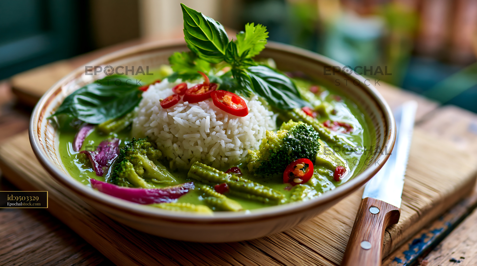 Watermarked full-resolution preview of Delicious green curry with rice, vegetables, and herbs in bowl