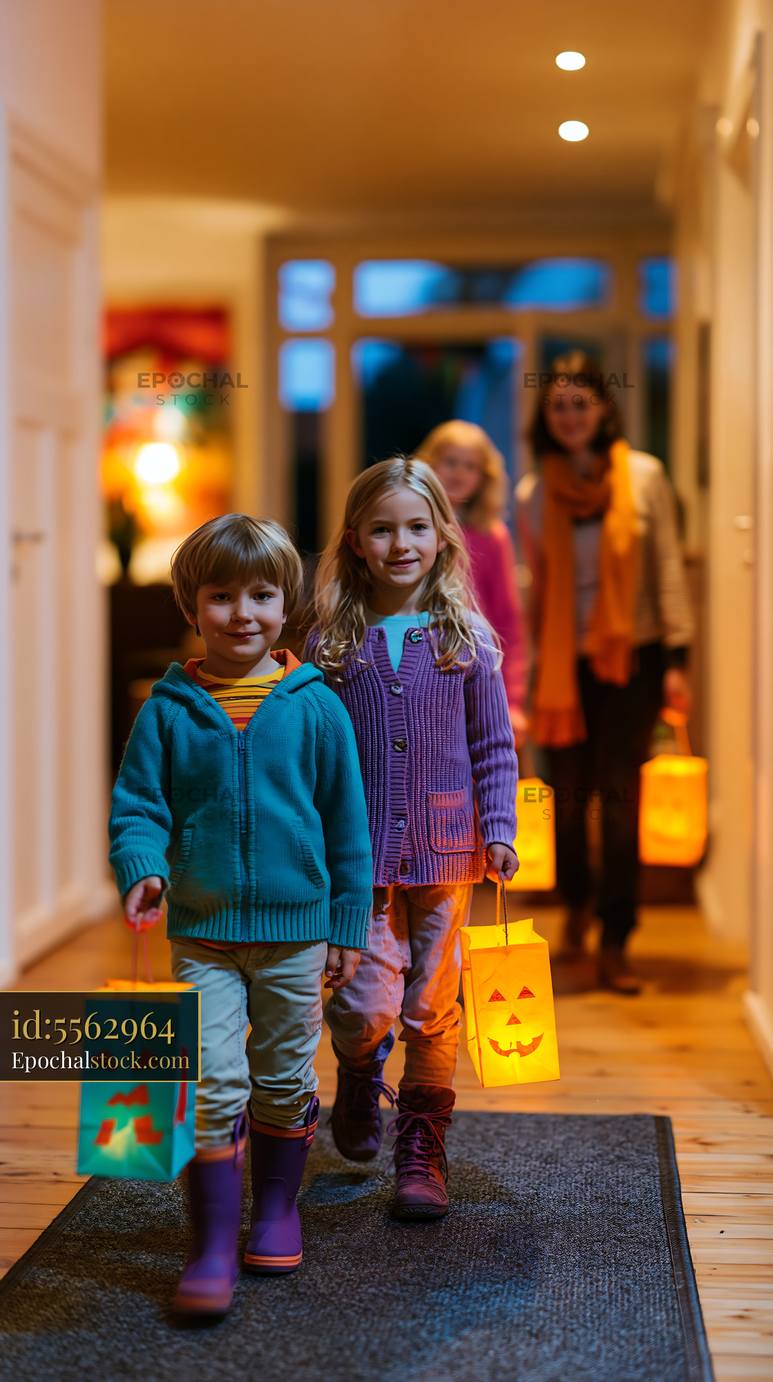 Watermarked full-resolution preview of Children walking with lanterns during Halloween celebration