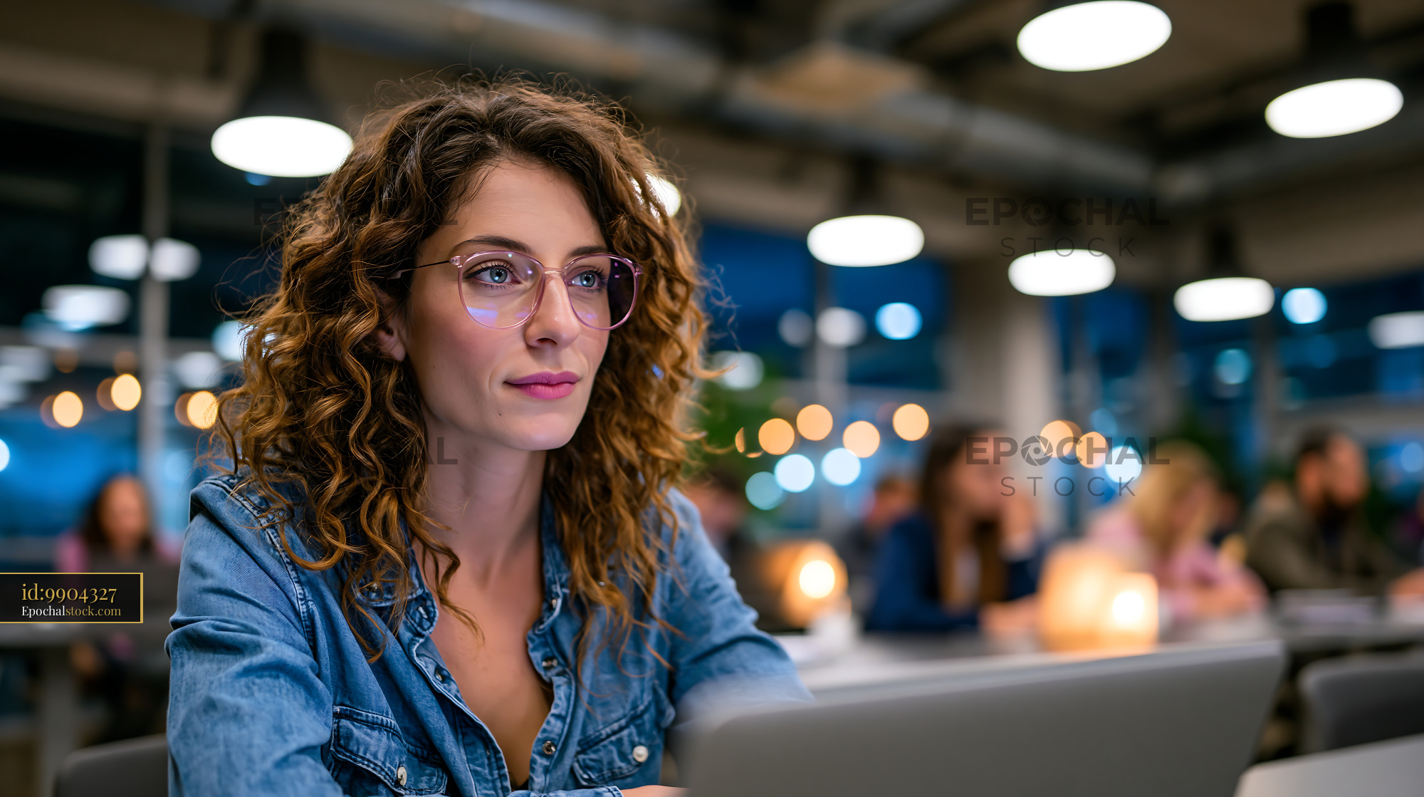 Working Woman at Computer in Modern Office at Night - stock photo