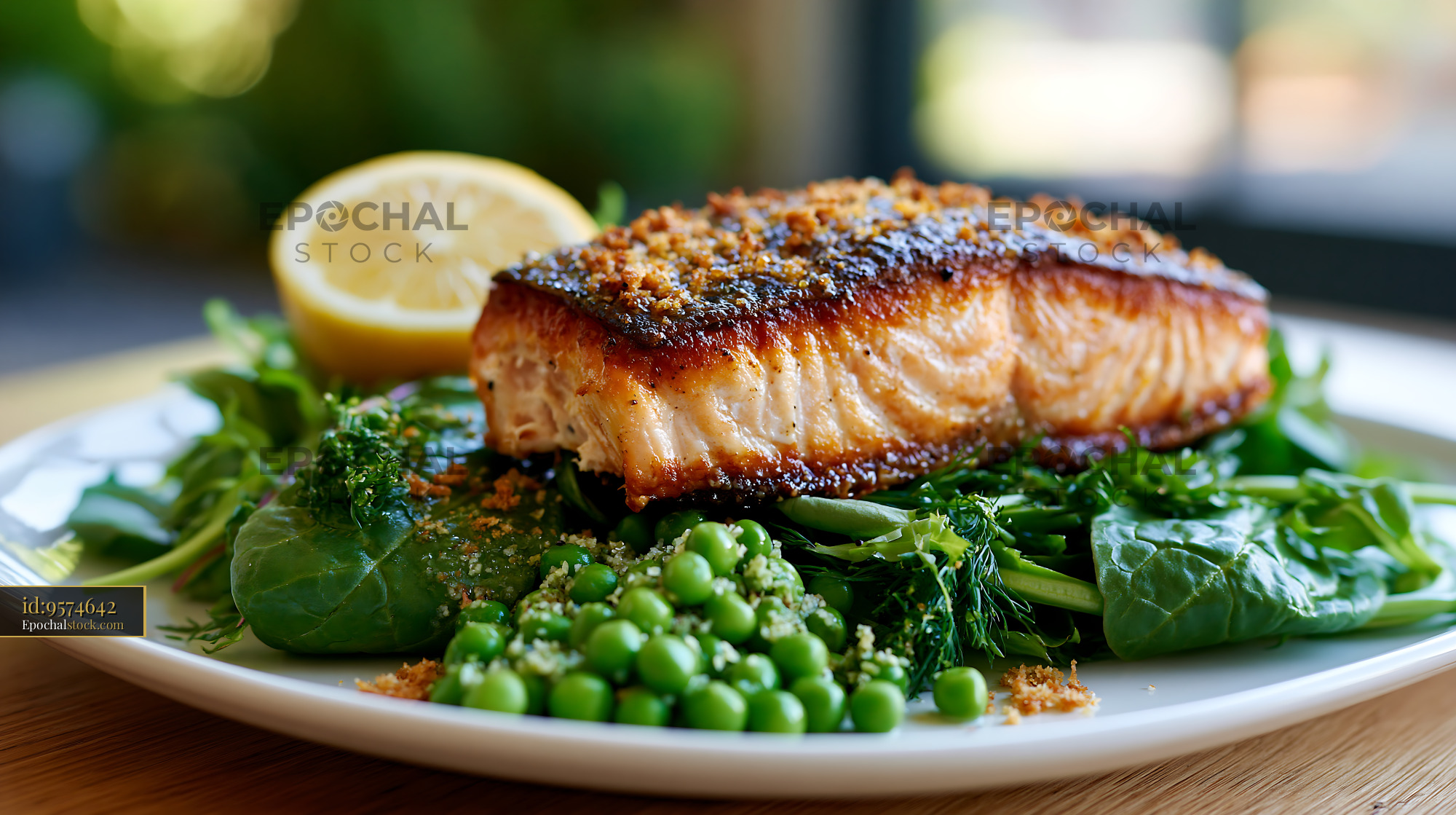 Watermarked full-resolution preview of Grilled salmon on a bed of greens with lemon wedge