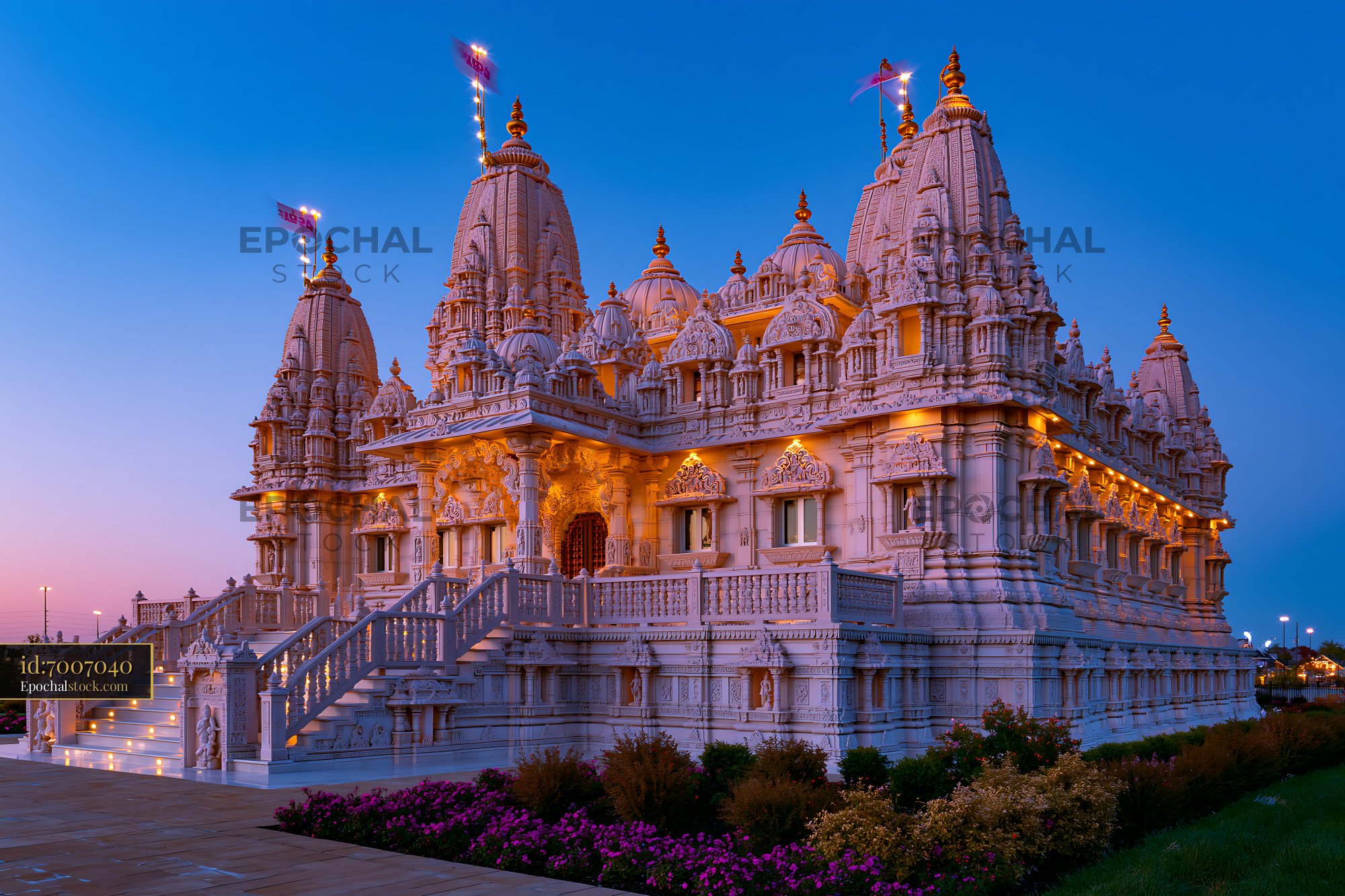 Watermarked full-resolution preview of Detailed view of a large temple at dusk with decorative lights