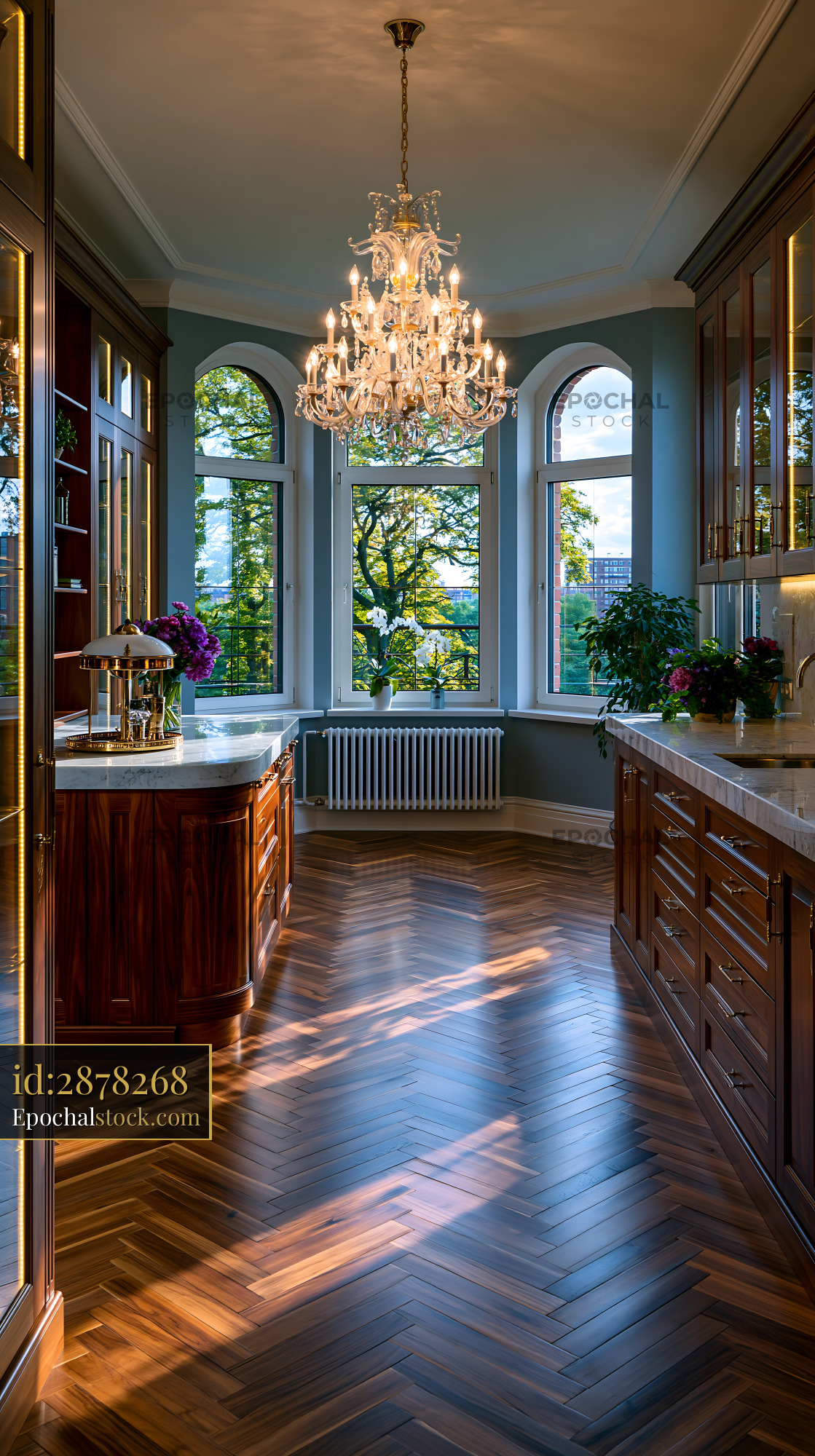 Watermarked full-resolution preview of Bright kitchen with large windows and wooden cabinetry