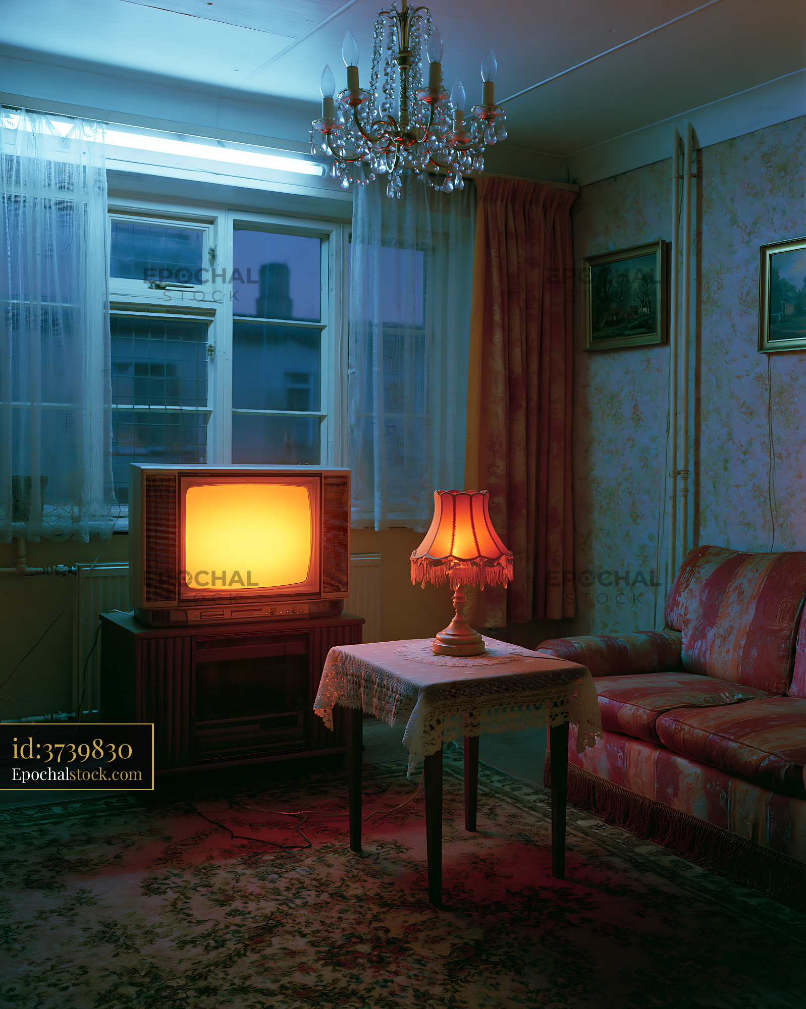 Watermarked full-resolution preview of Living room with vintage television and lamp at night