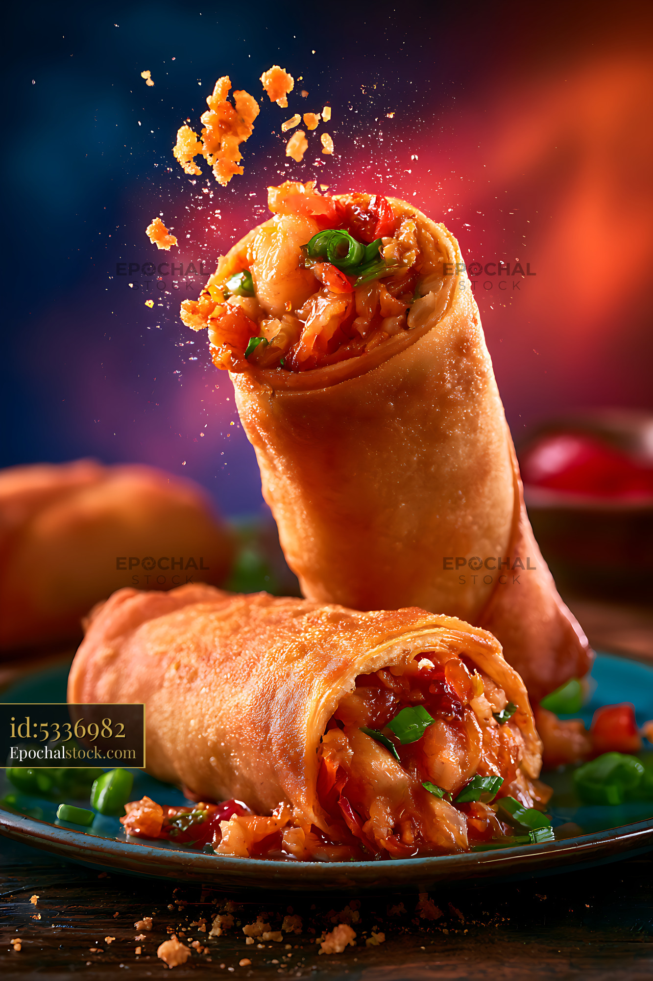 Watermarked full-resolution preview of Two colorful filled wraps on a plate