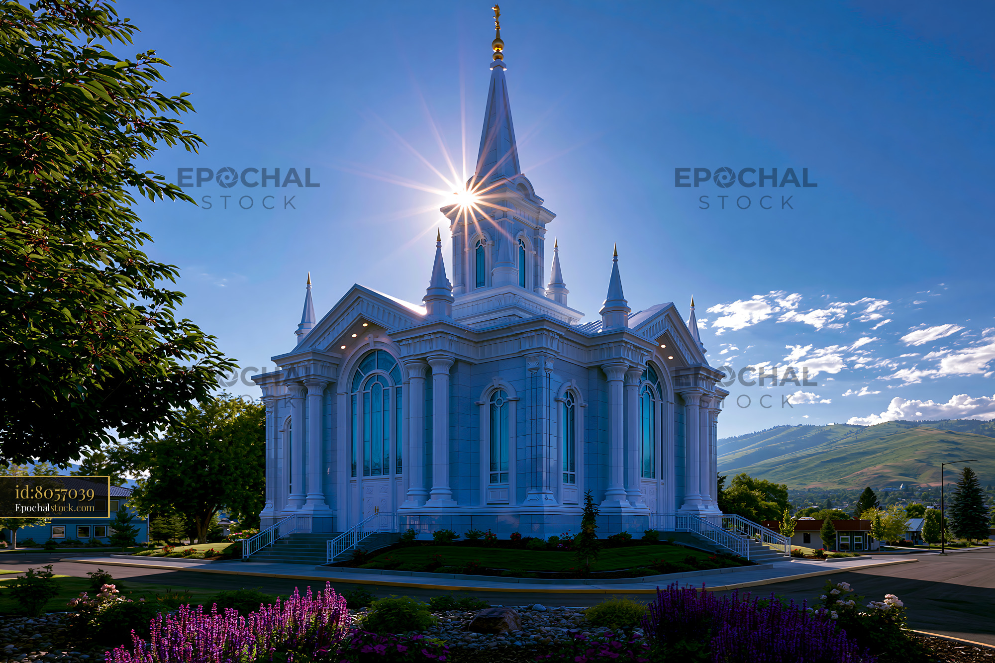 Watermarked full-resolution preview of Church building with a tall spire and sunlight shining through