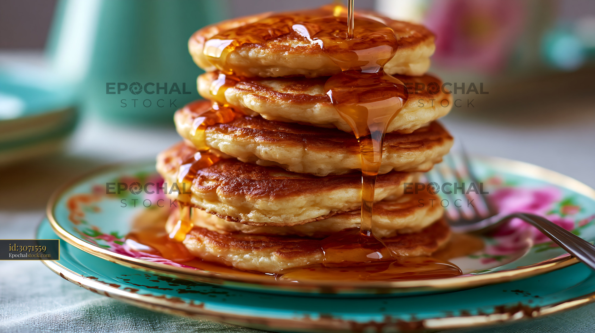 Watermarked full-resolution preview of Stack of pancakes with syrup on a decorative plate