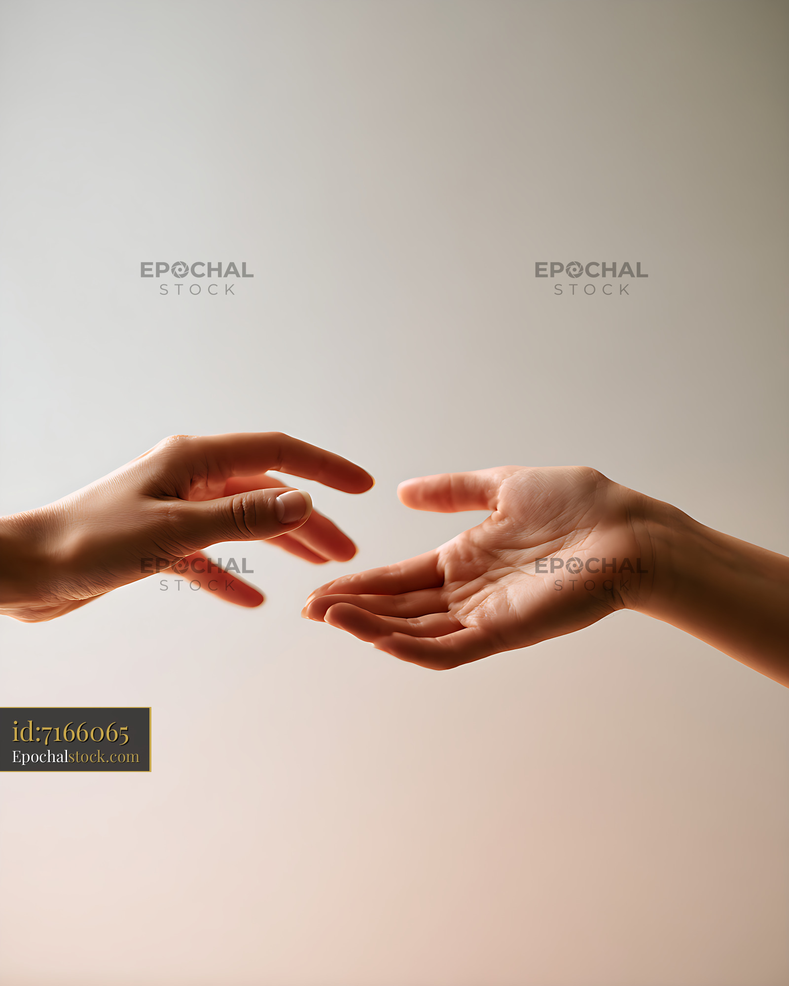 Watermarked full-resolution preview of Two hands reaching toward each other in soft warm light
