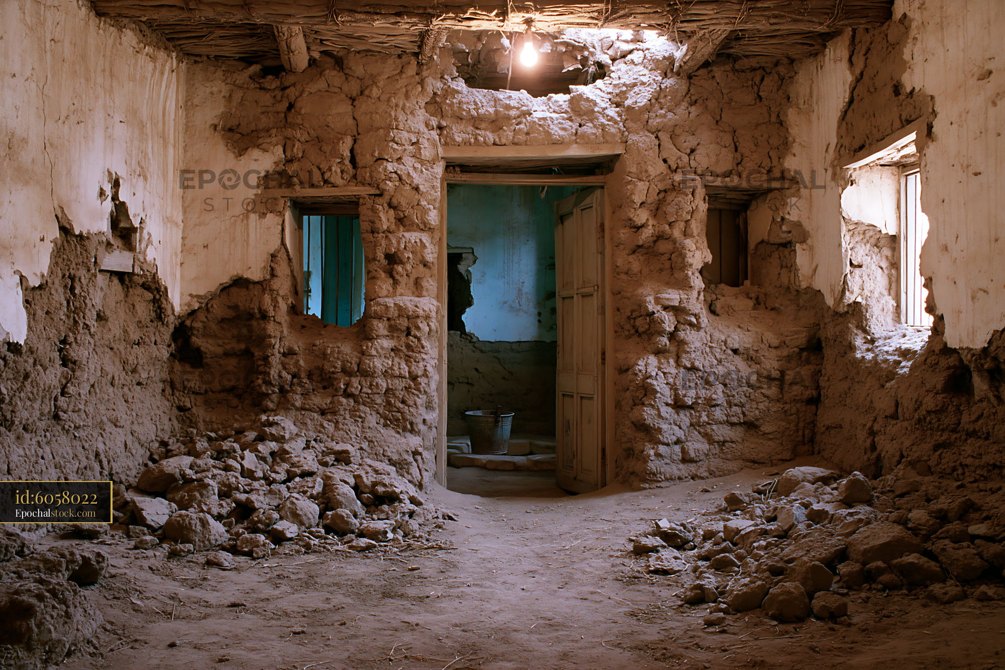 Watermarked full-resolution preview of Old abandoned house interior with damaged walls and dirt floor