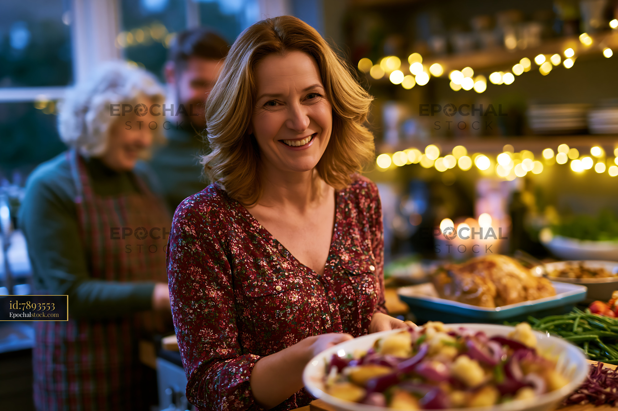 Family Preparing Traditional Festive Food at Home During Celebration - stock photo