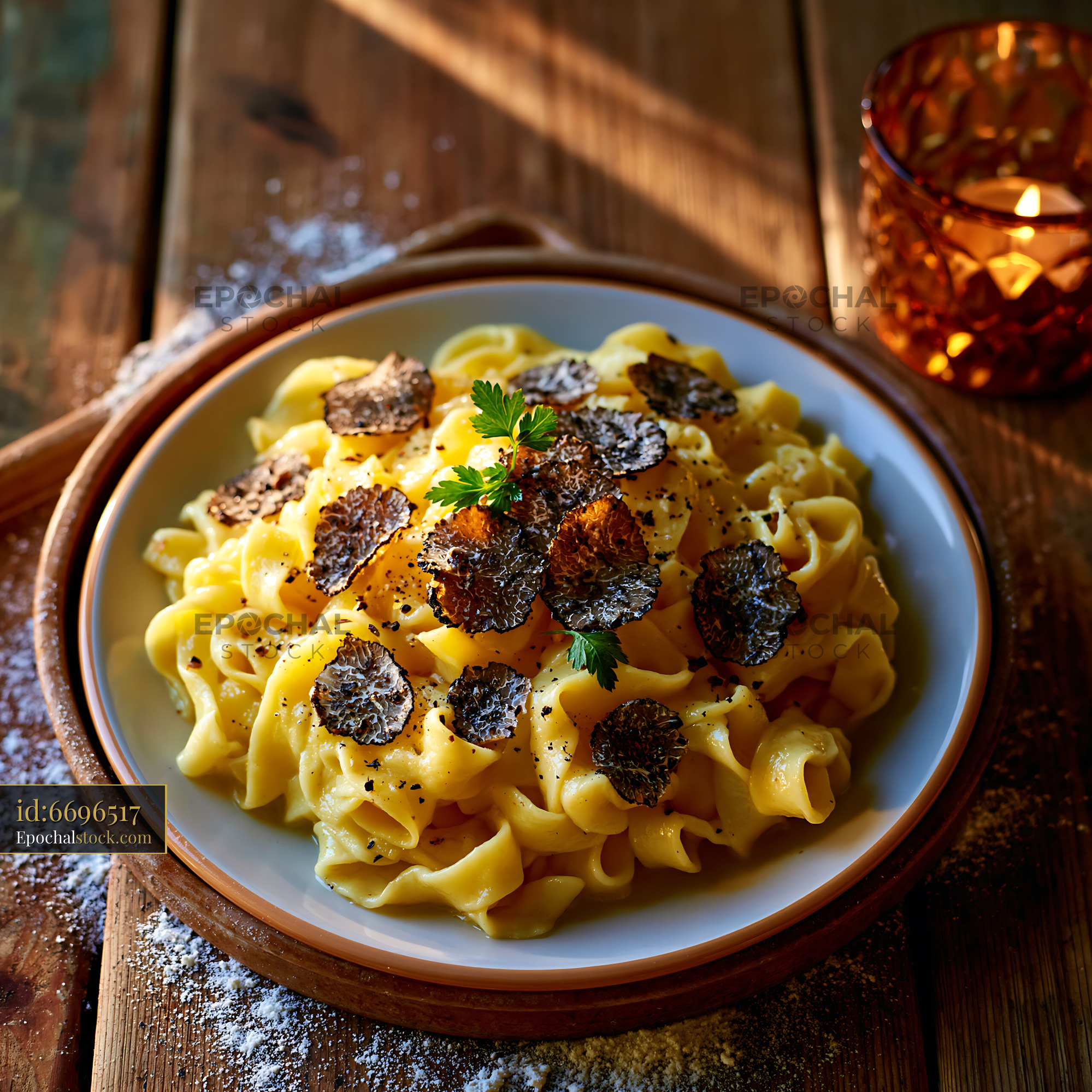 Watermarked full-resolution preview of Plate of pasta with truffles served on wooden table