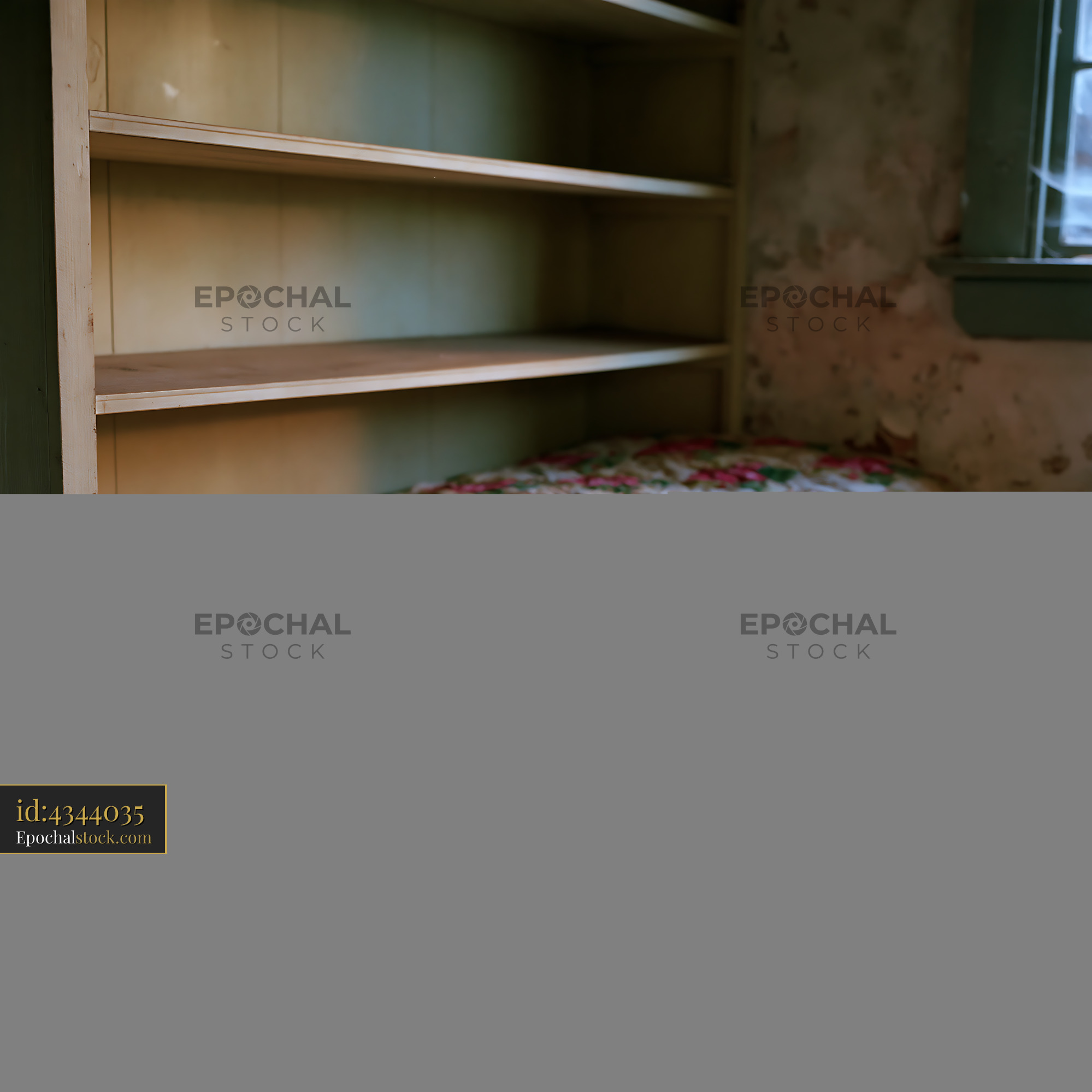 Watermarked full-resolution preview of Old bed with floral quilt in an abandoned room with shelves