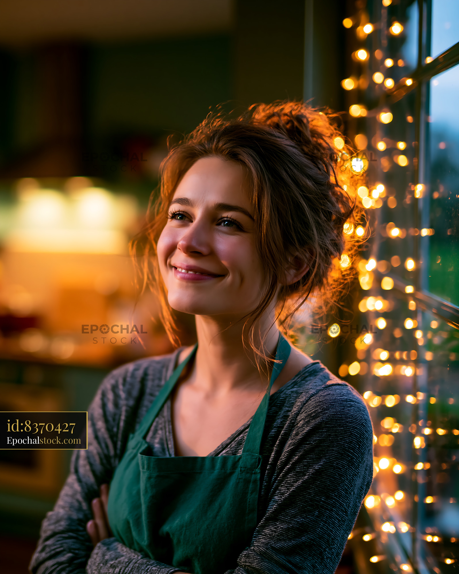 Watermarked full-resolution preview of Woman smiling near window with fairy lights