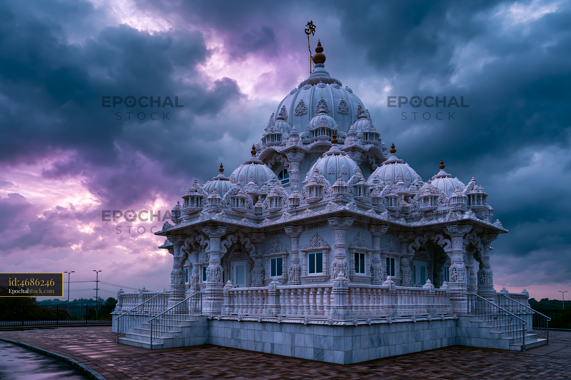 Watermarked full-resolution preview of Sunset over a white temple with multiple domes under cloudy sky